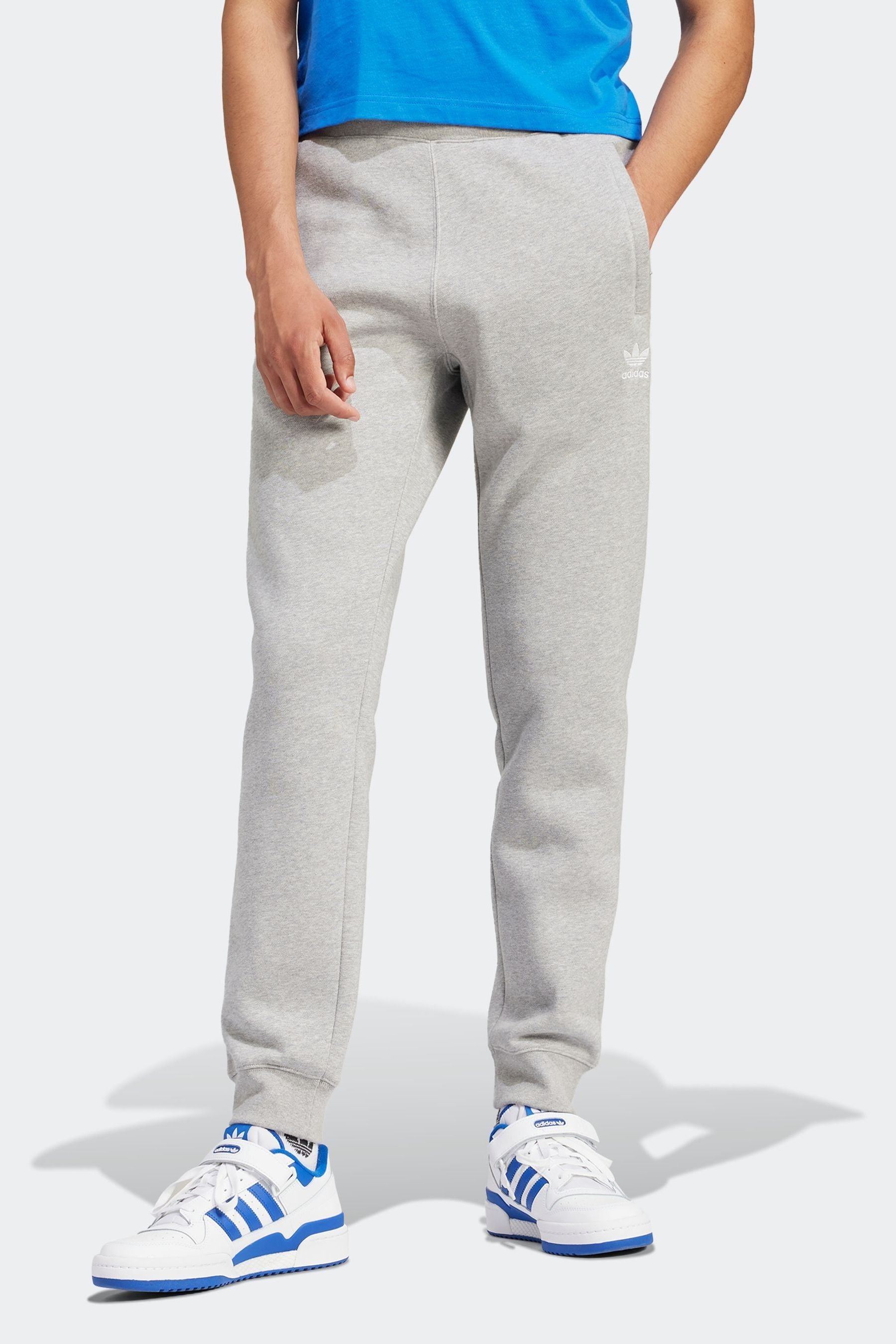 Adidas originals joggers with trefoil print in grey shop