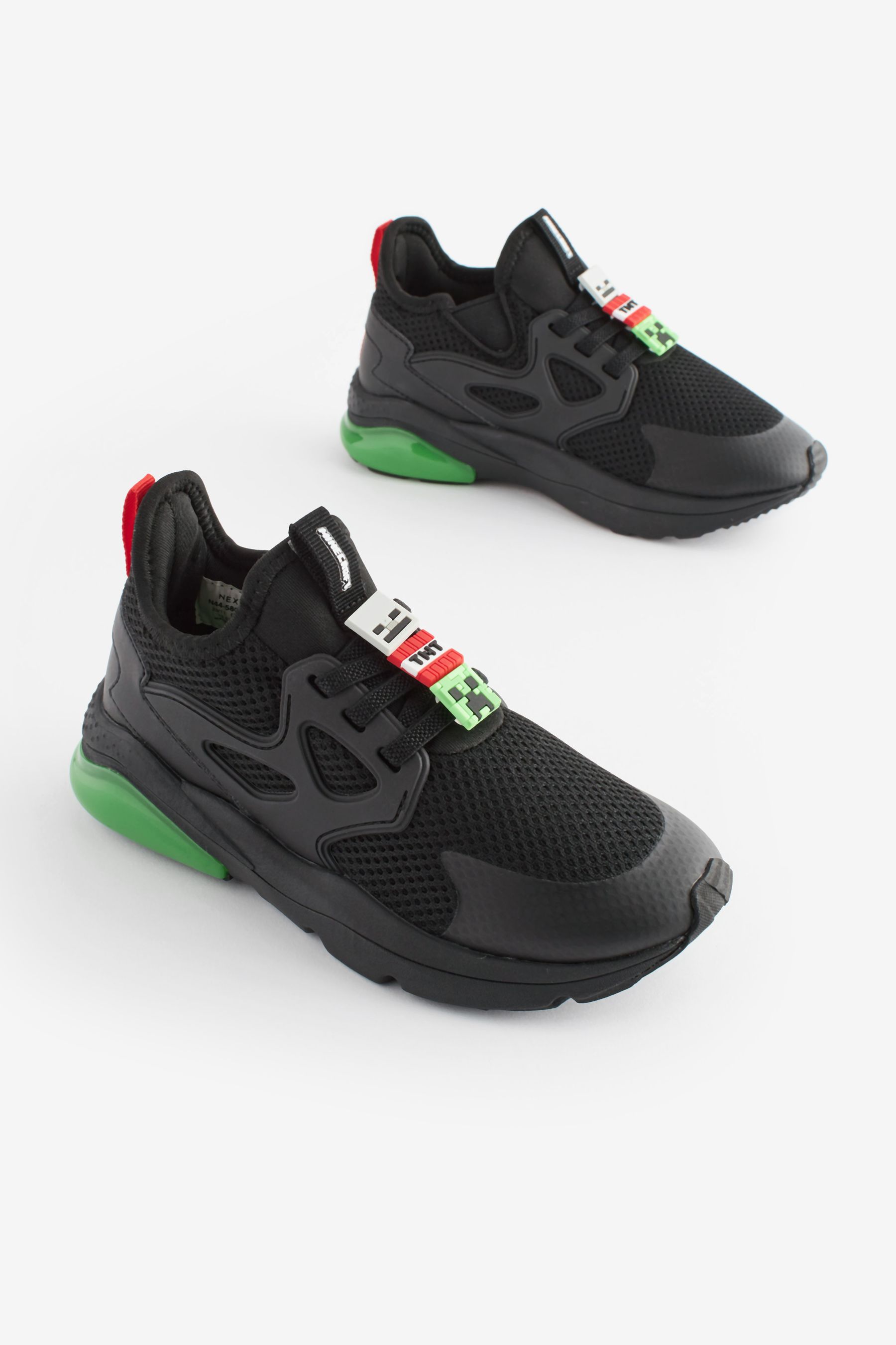 Black elastic trainers store