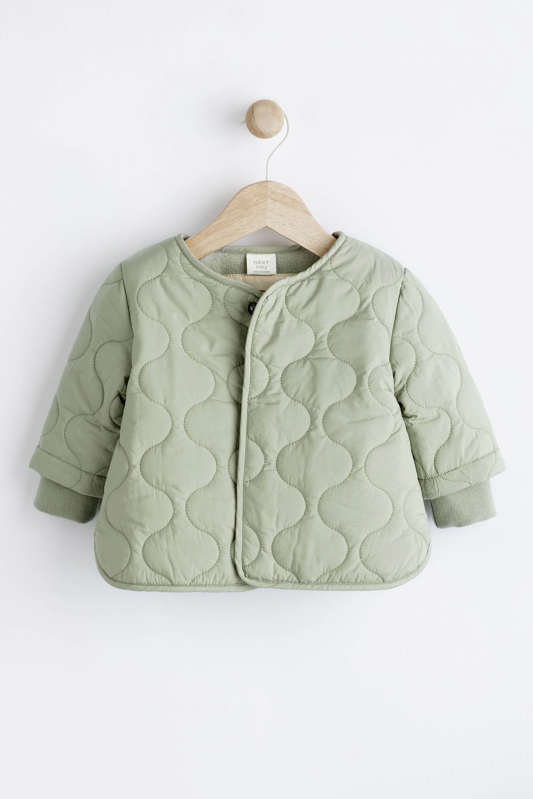 Buy Sage Green Baby Quilted Jacket 0mths 2yrs from Next Luxembourg