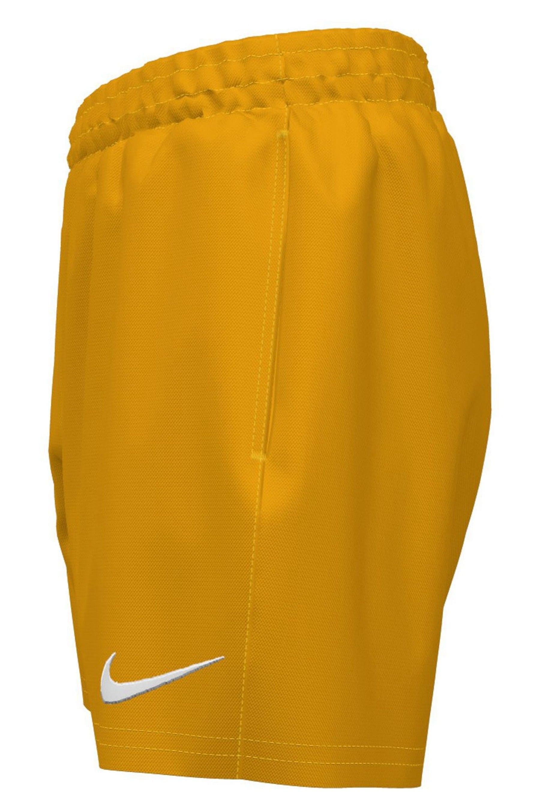 Nike yellow swim shorts online