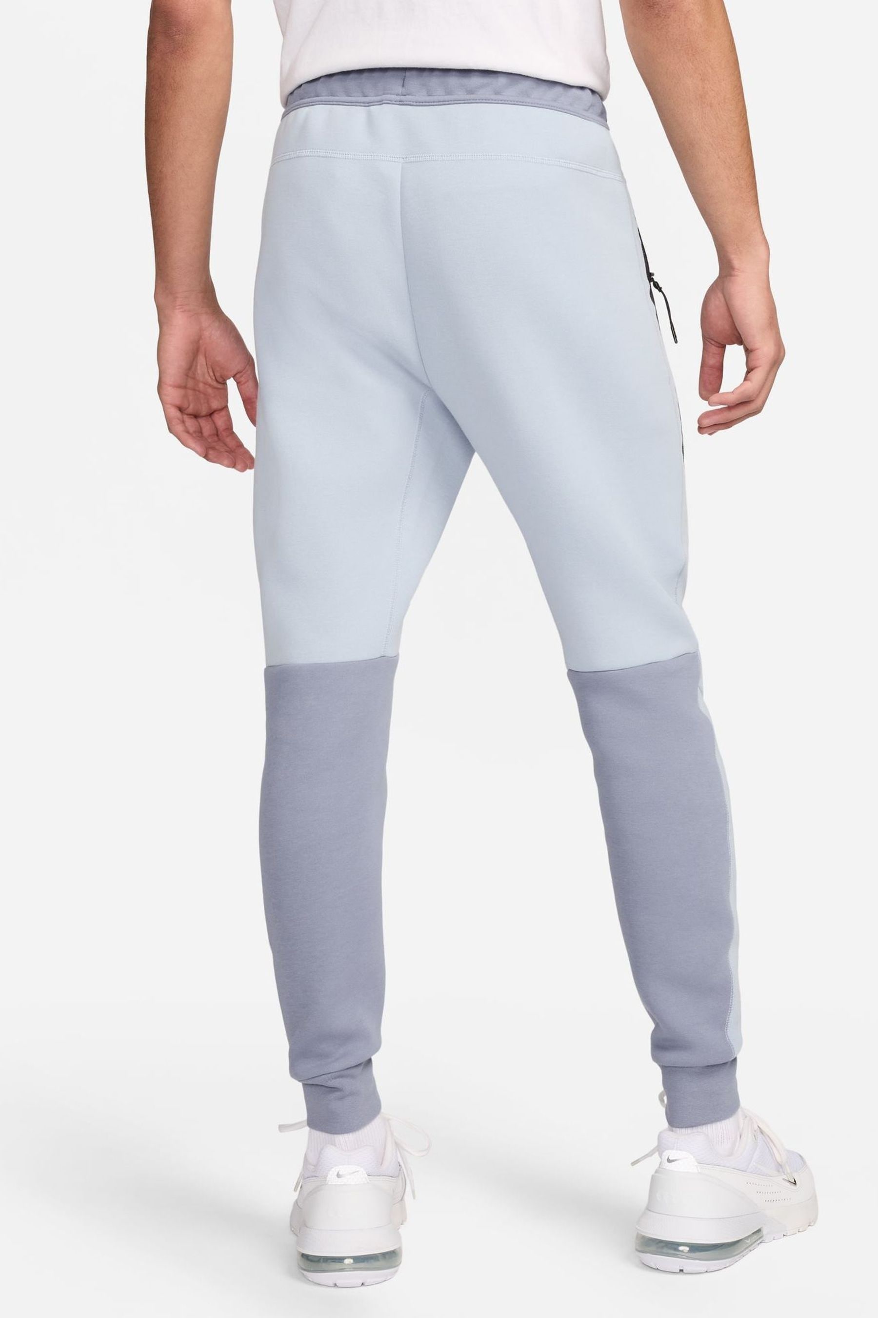 Light blue nike tech tracksuit top