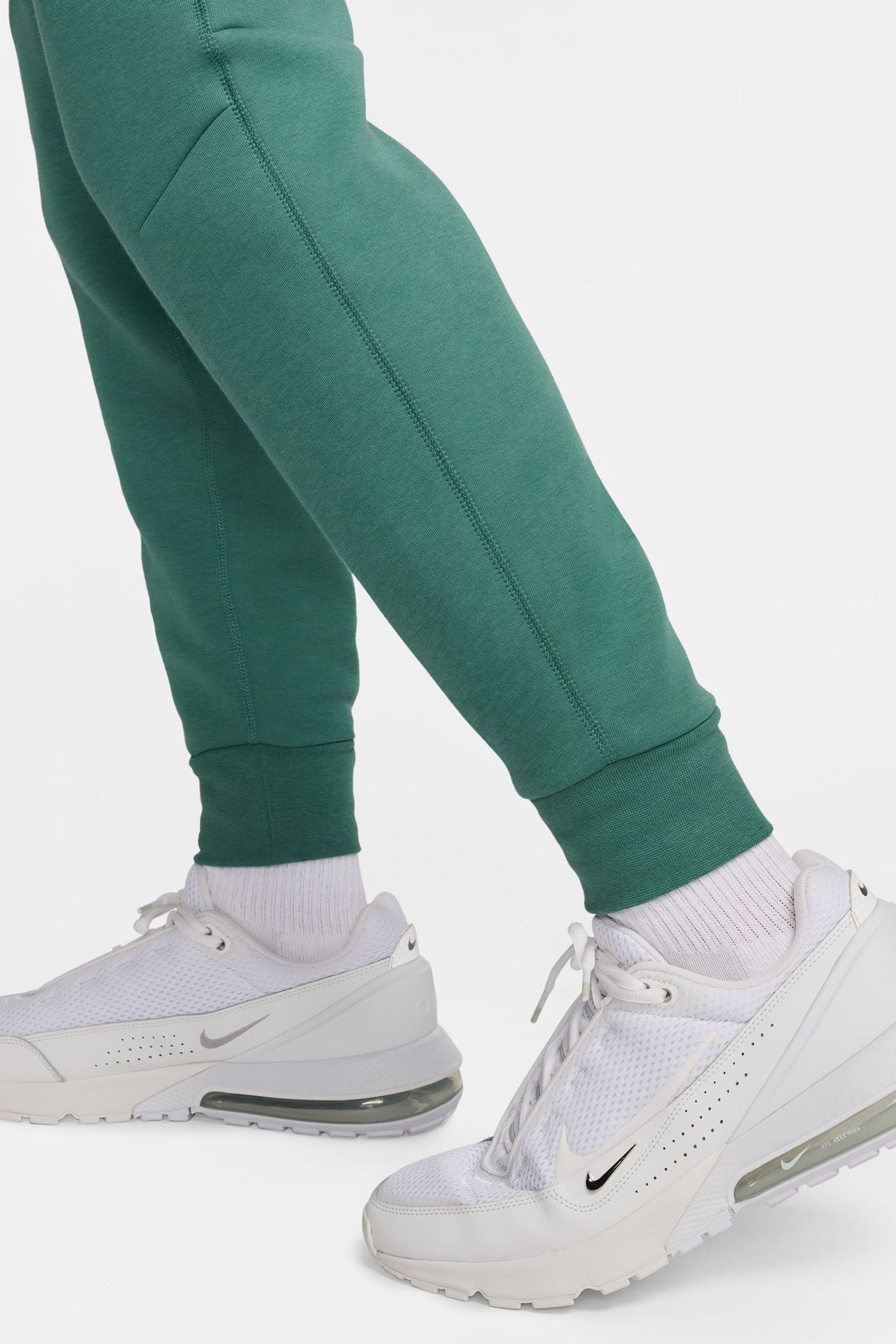 Buy Nike Green Black Tech Fleece Joggers from Next Germany