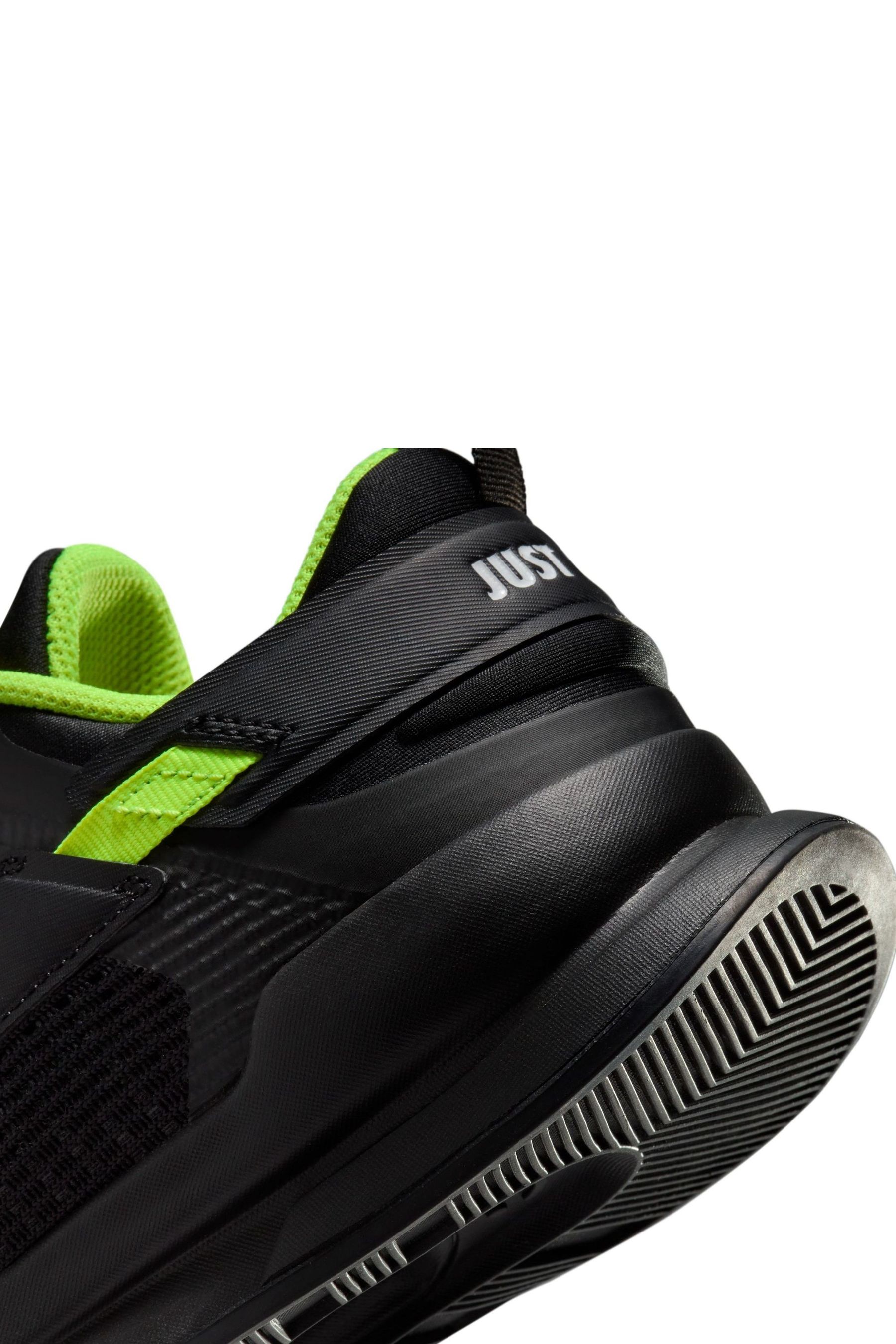 Black lime green nike shoes top