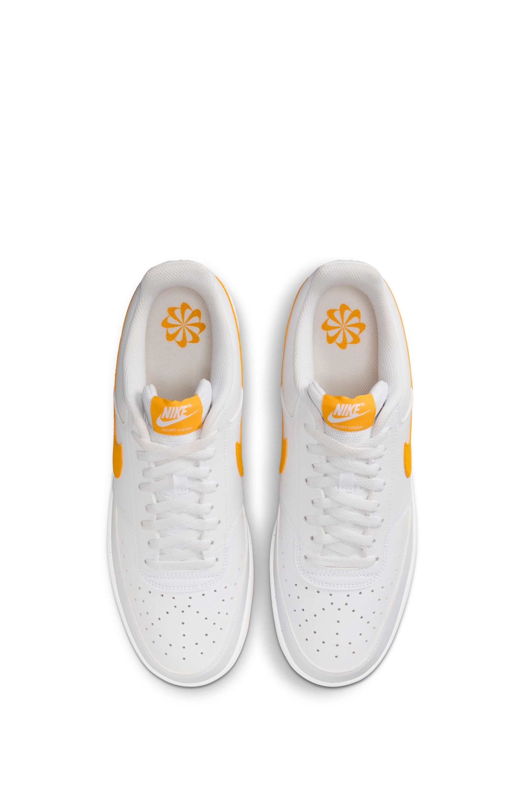 Nike white and yellow trainers store