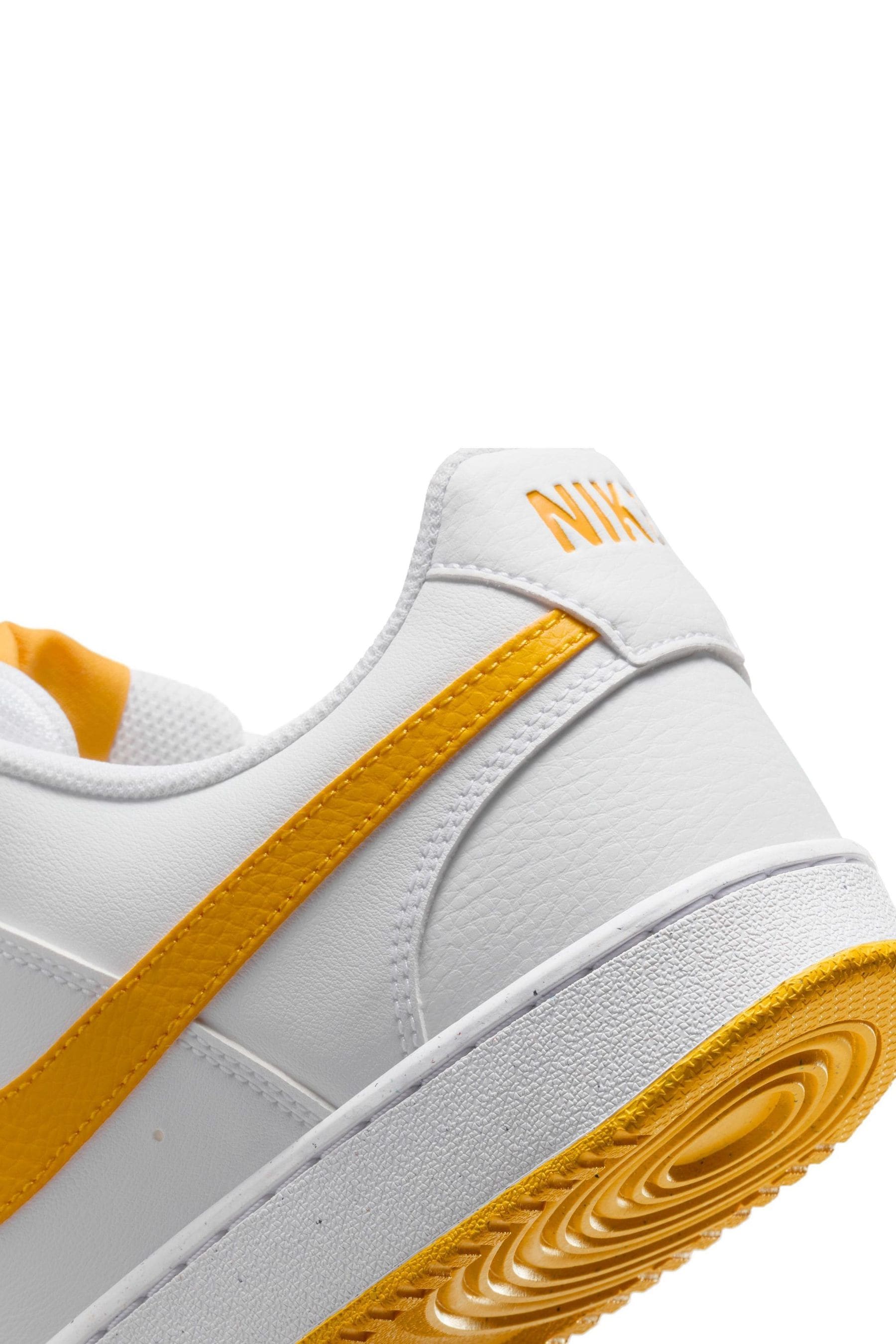 Buy Nike Yellow White Court Vision Low Trainers from the Next UK online shop