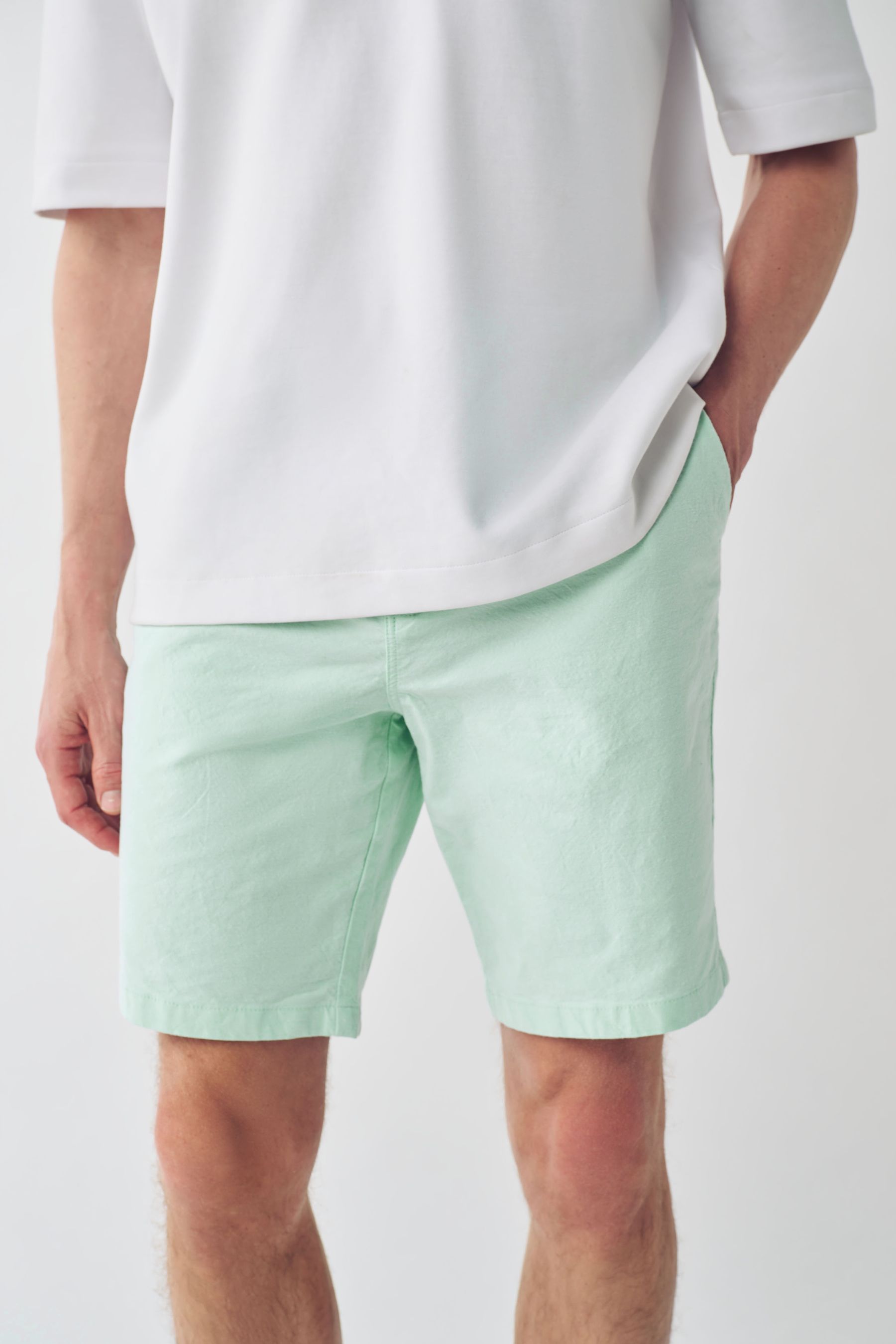 Buy Mint Green Slim Fit Stretch Chinos Shorts from the Next UK online shop