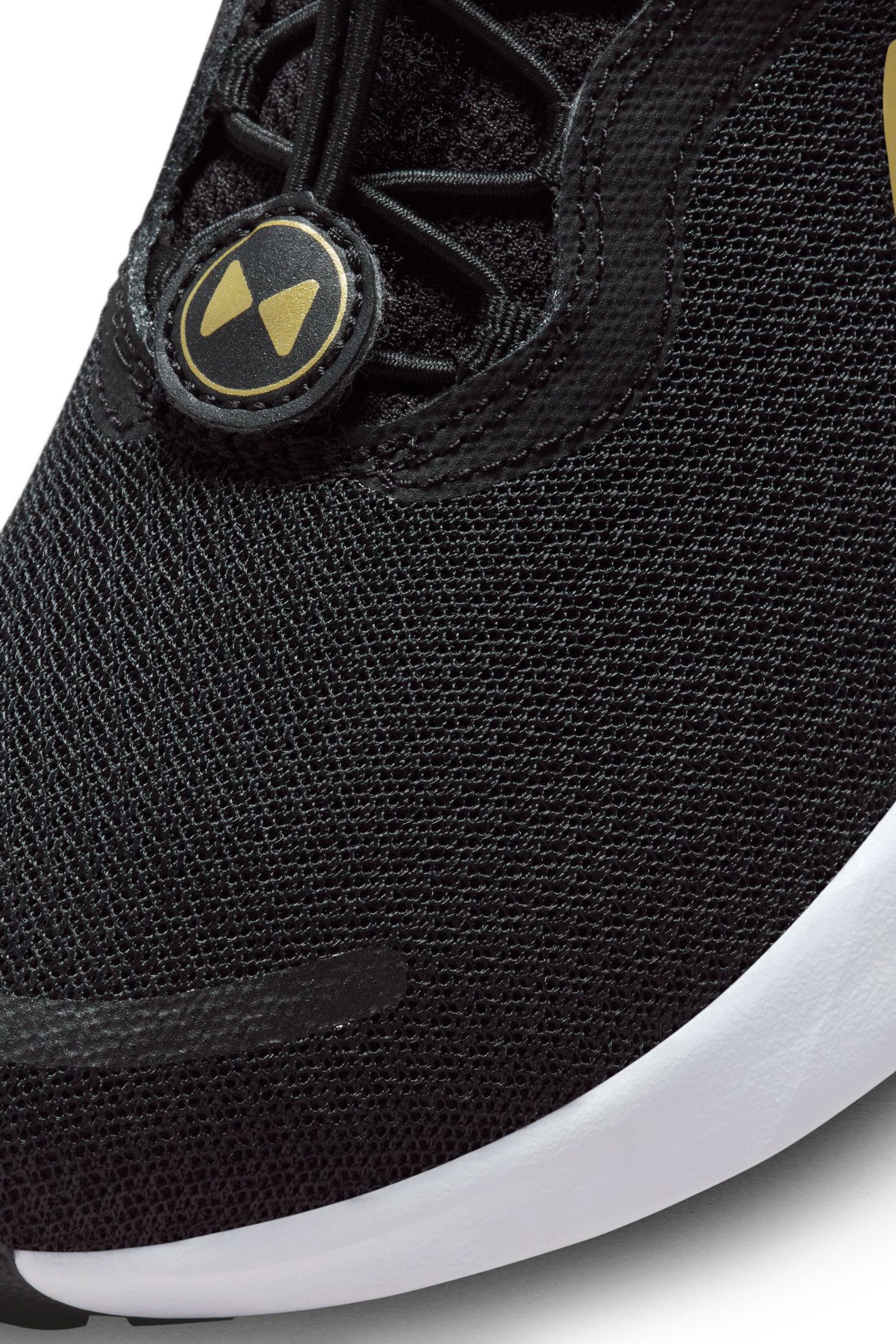 Nike running legend react trainers in black and gold online