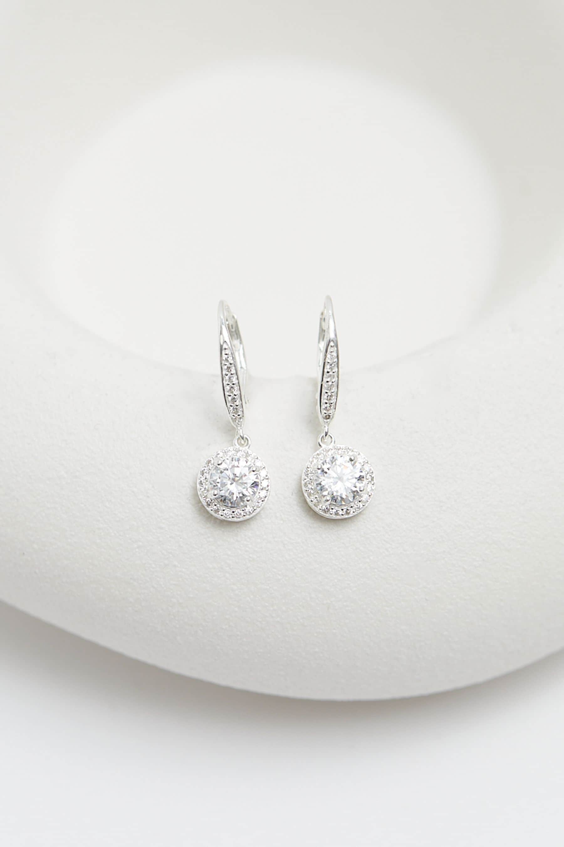 Buy Simply Silver Sterling Silver Tone 925 White Cubic Zirconia Clara Drop Earrings from the Next UK online shop