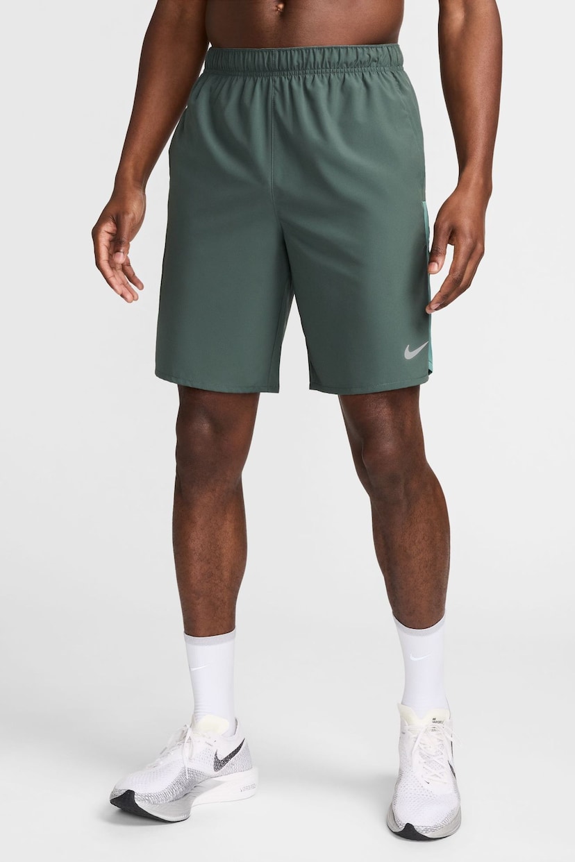 Nike Dark Green 9 Inch Dri-FIT Challenger Unlined Running Shorts - Image 1 of 9