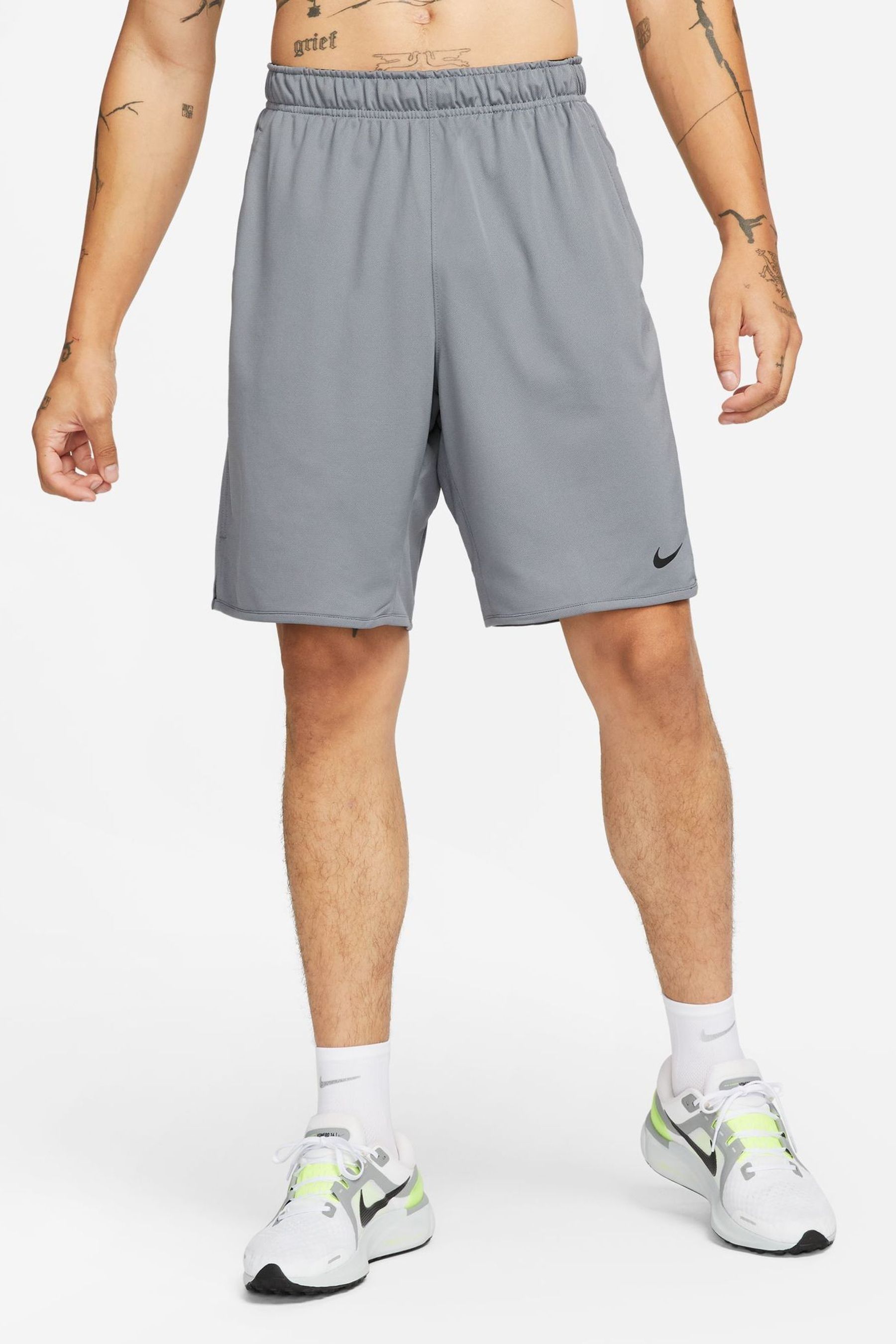 Buy Nike Grey Totality Dri FIT 9 inch Unlined Versatile Shorts from the Next UK online shop