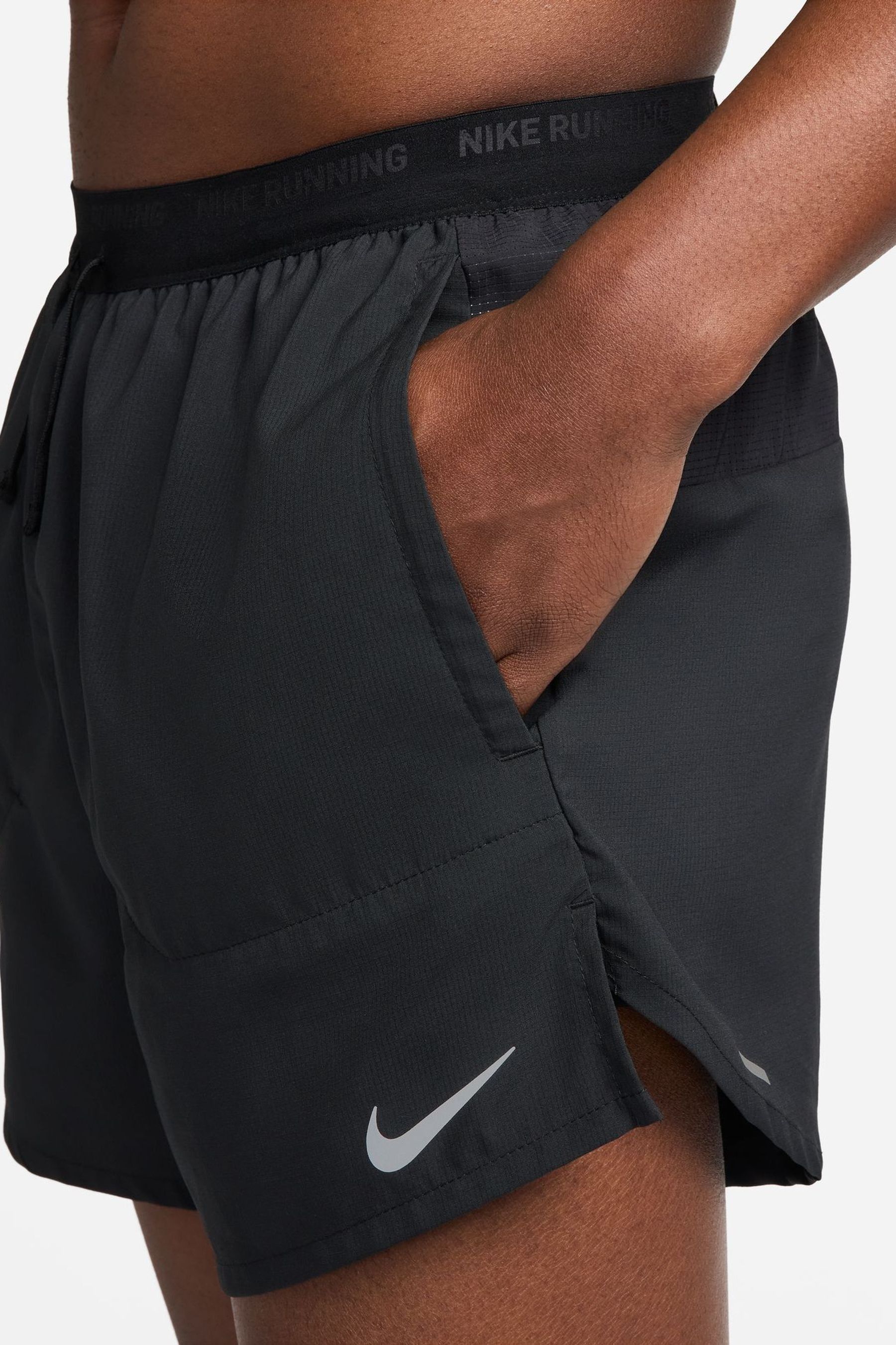 Buy Nike Black Grey Dri FIT Stride 5 Inch Running Shorts from Next France