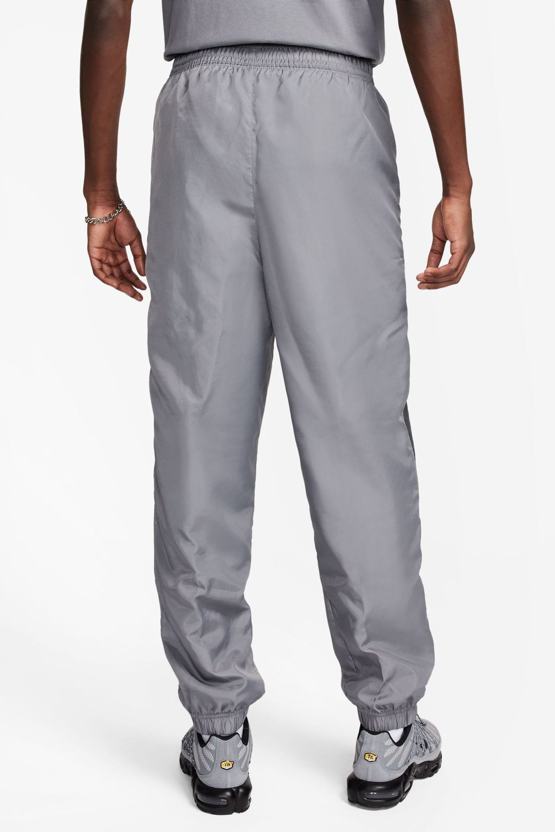Grey lacoste guppy pants online