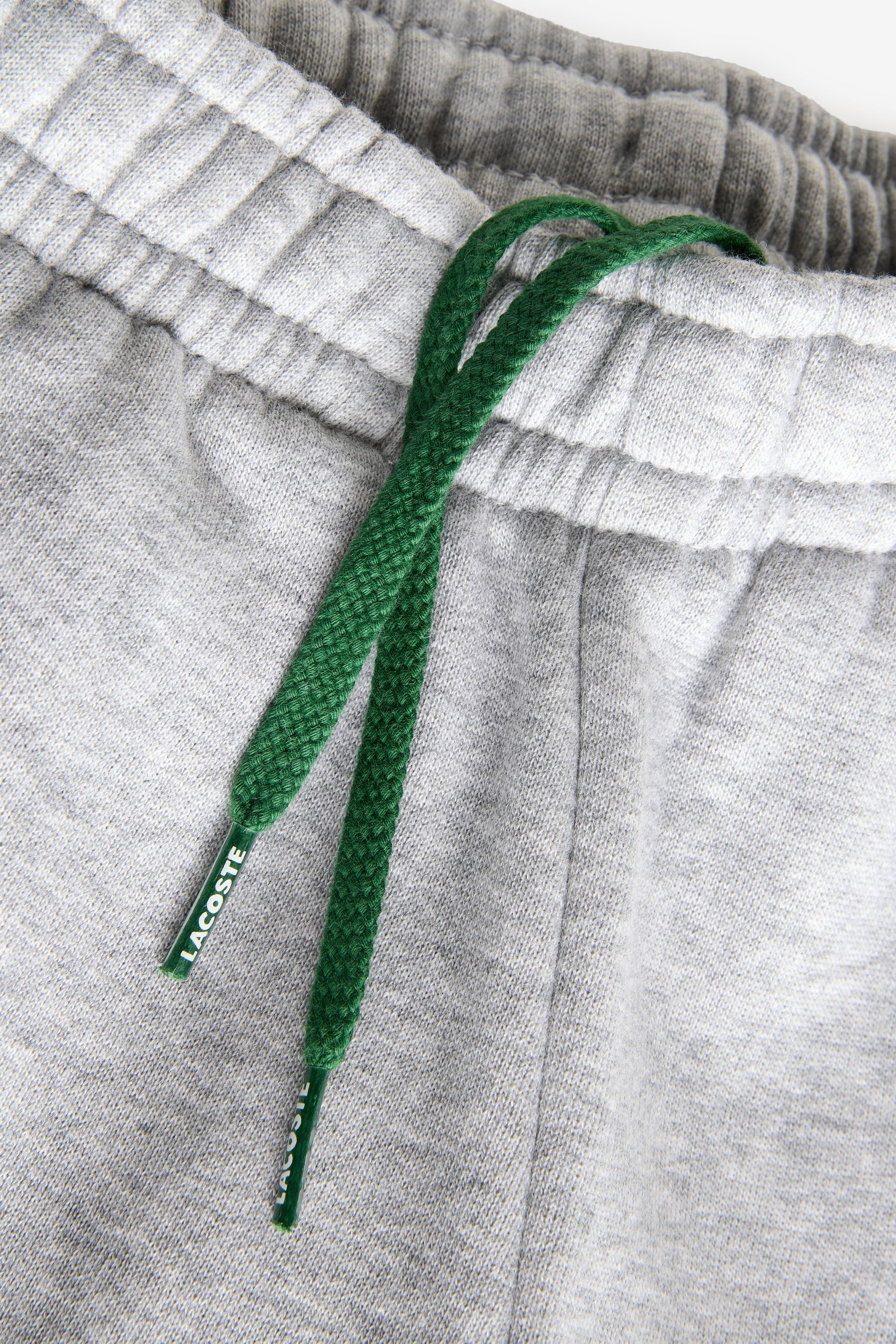 Blue lacoste joggers clearance