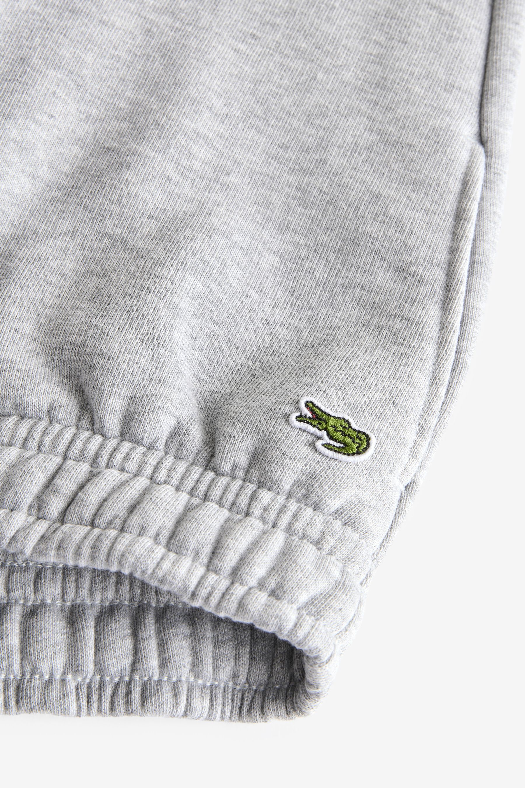 Blue lacoste joggers top