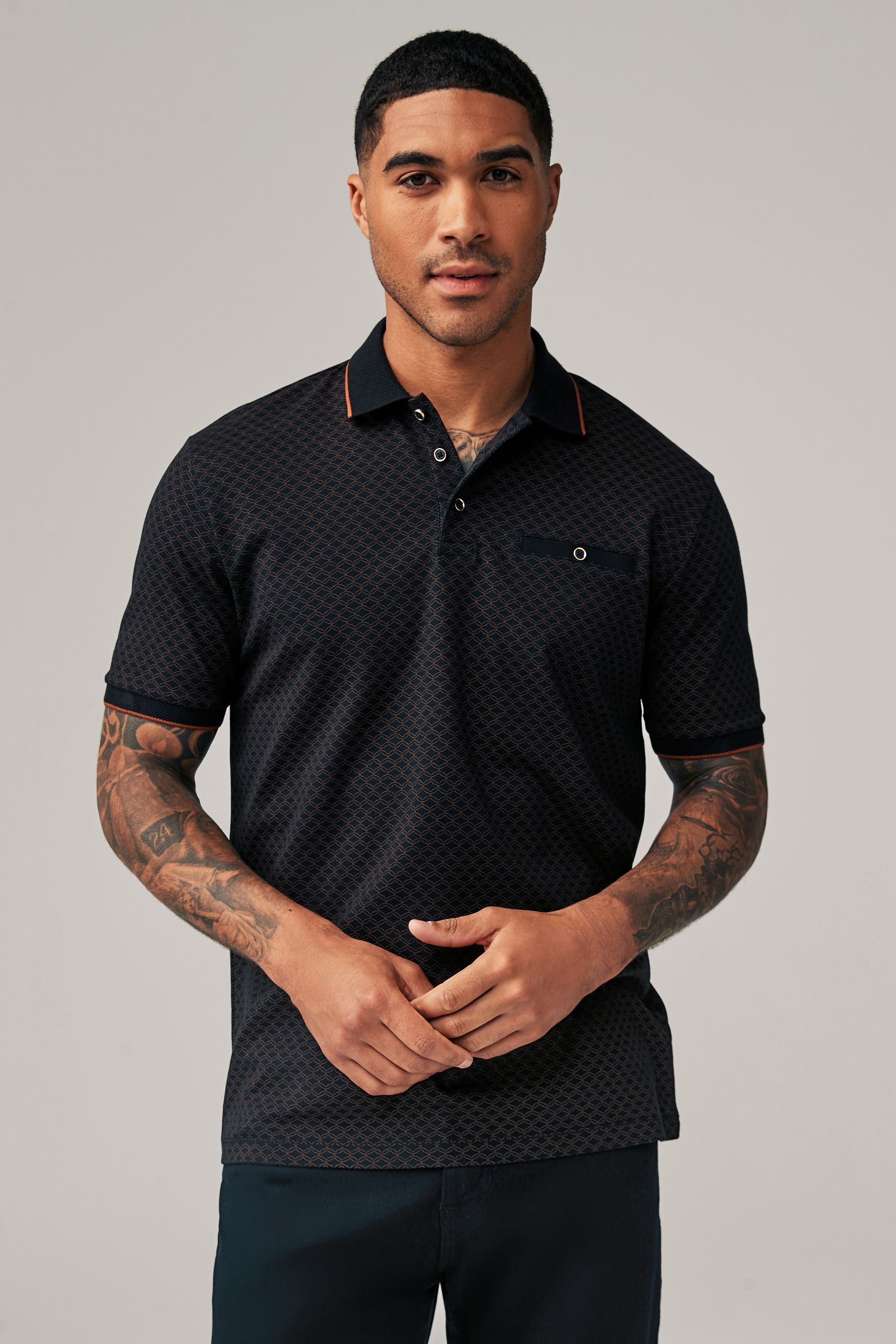 Buy Black Gold Short Sleeve Print Polo Shirt from the Next UK online shop