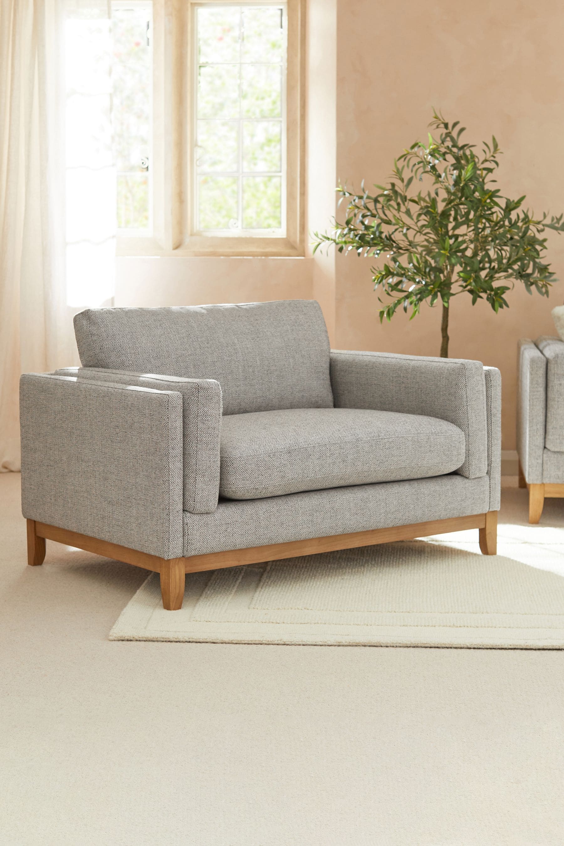 Grey snuggle chair next outlet