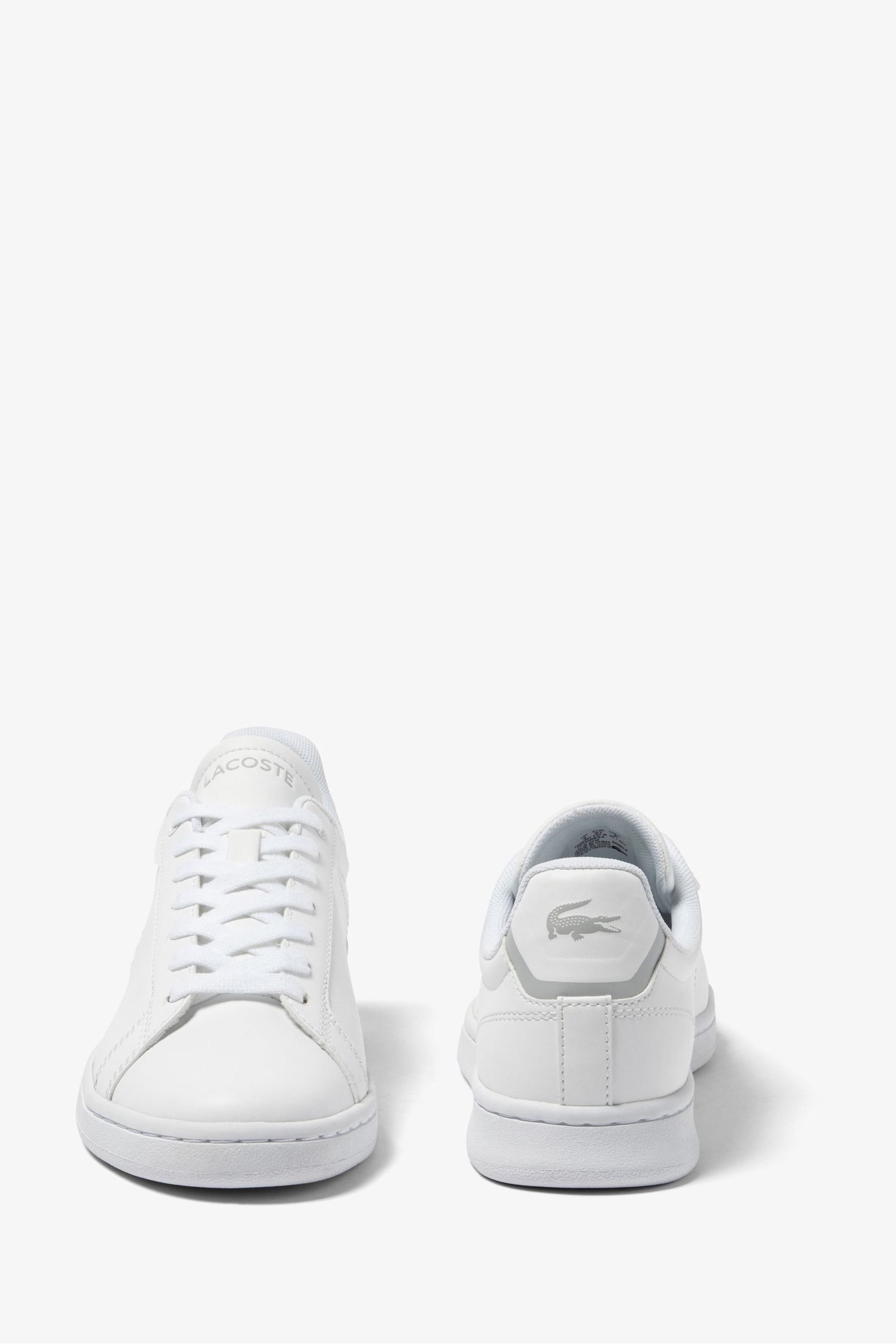 Boys white lacoste trainers 2025