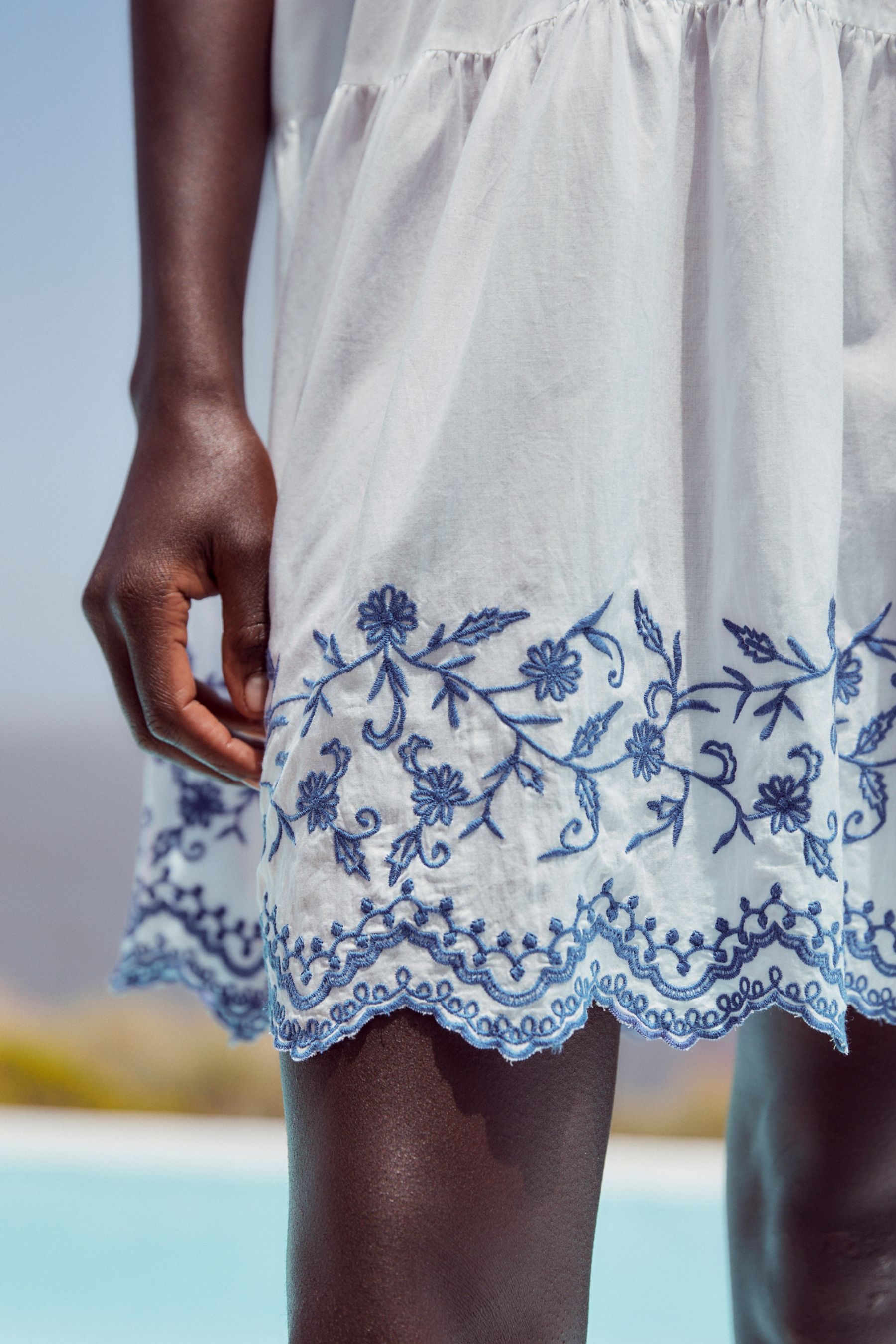 Buy White Blue Embroidered Hem Tiered Mini Dress from Next Luxembourg