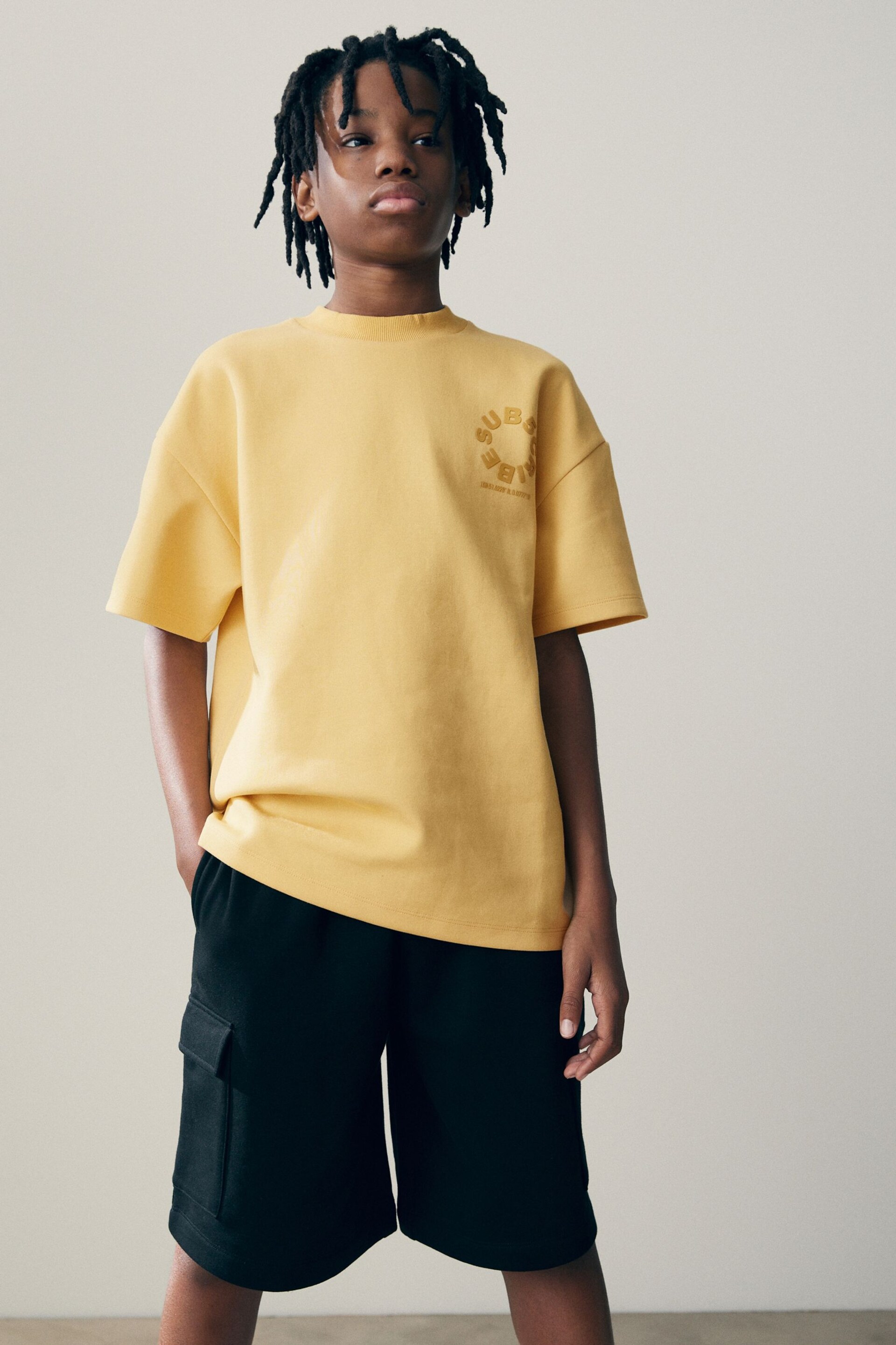 Yellow Buttermilk Subscribe BackPrint Relaxed Fit Heavyweight Short Sleeve T-Shirt (3-16yrs) - Image 1 of 6