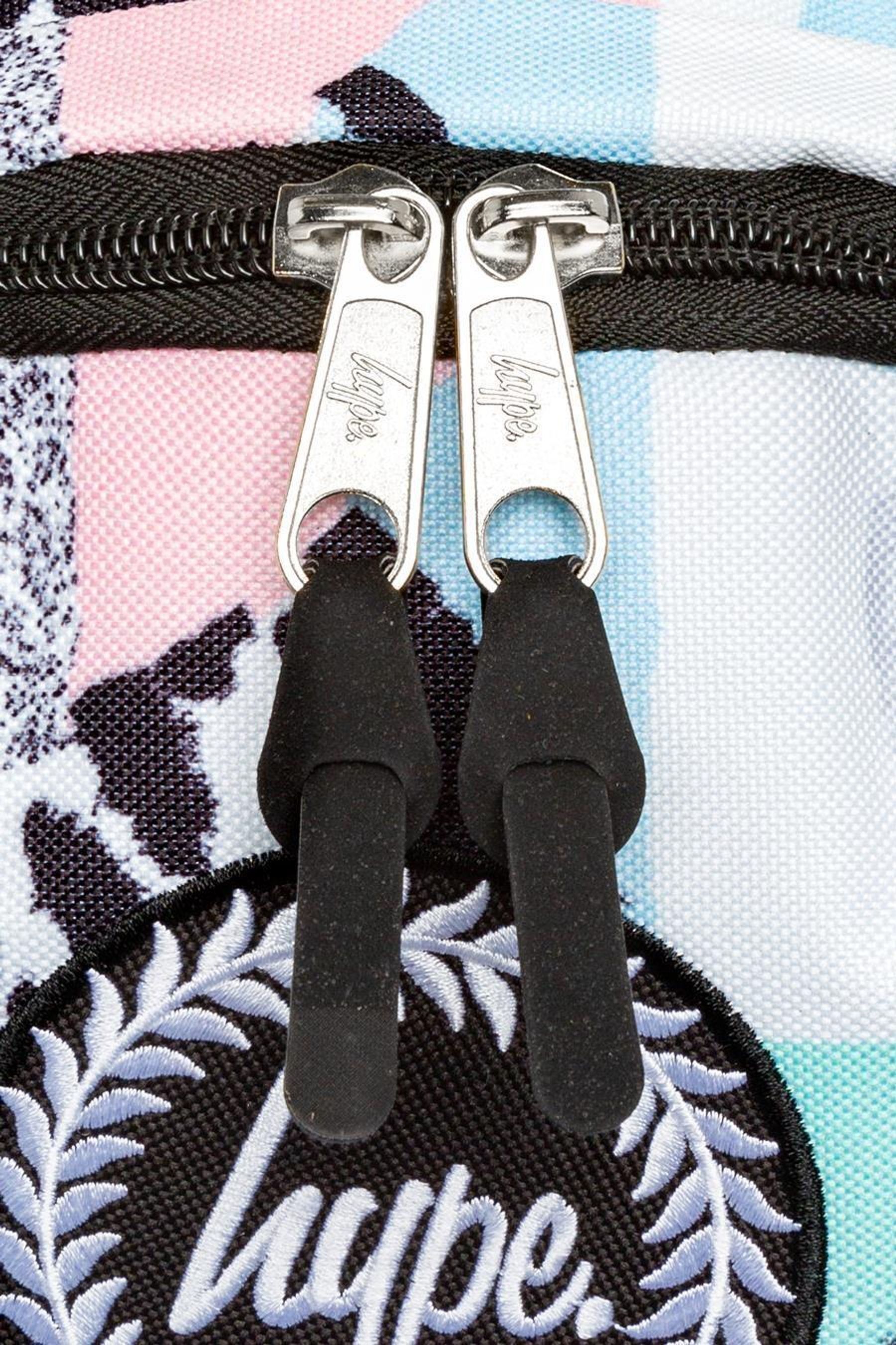 Buy Hype. Unisex Blue Pastel Abstract Crest Backpack from Next Saudi Arabia