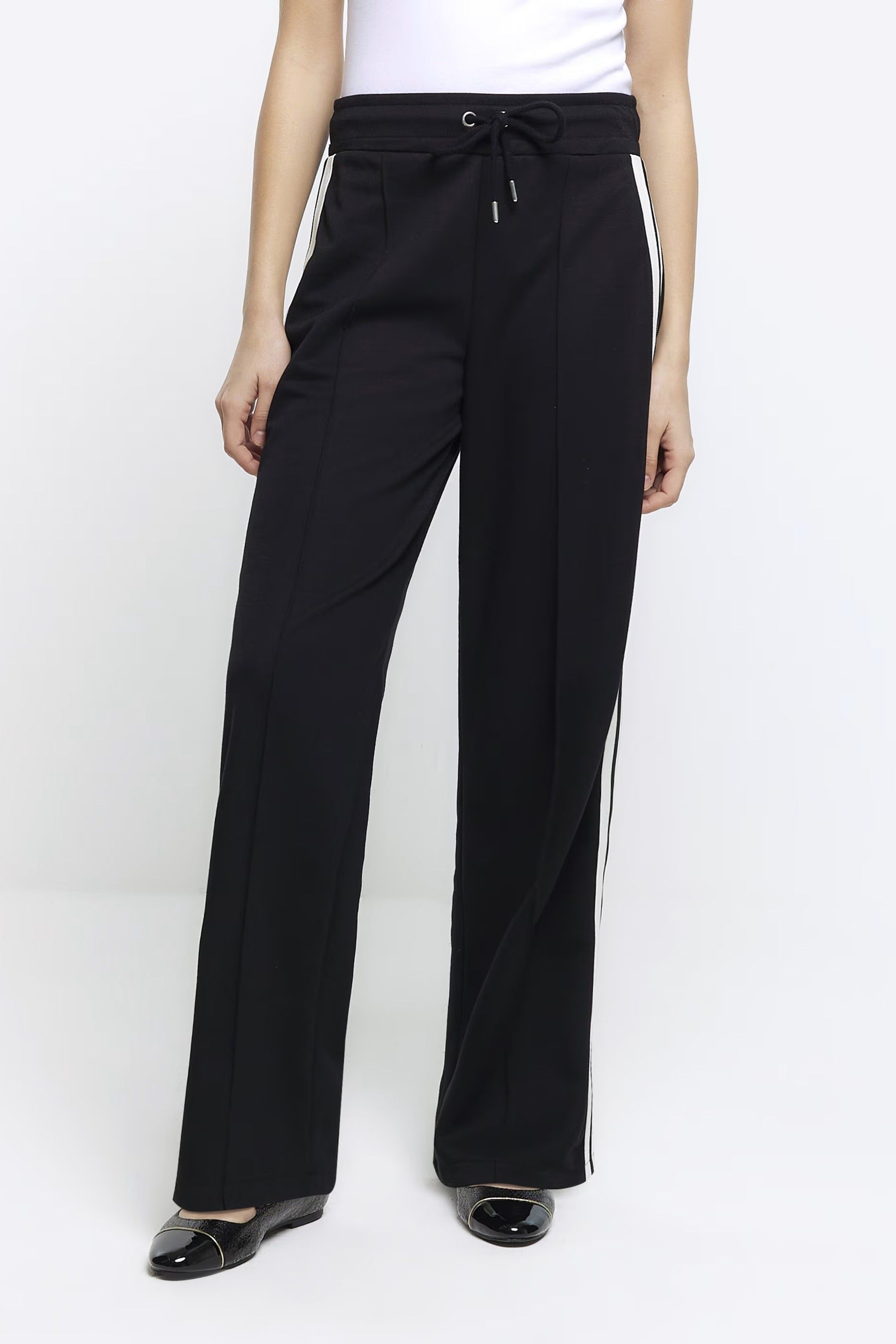 Buy River Island Black Tailored Wide Leg Side Stripe Joggers from Next Germany
