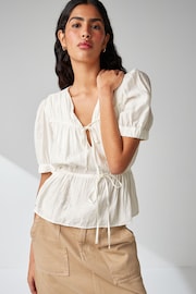 White Tie Front Tiered Textured Short Sleeve Blouse - Image 1 of 6