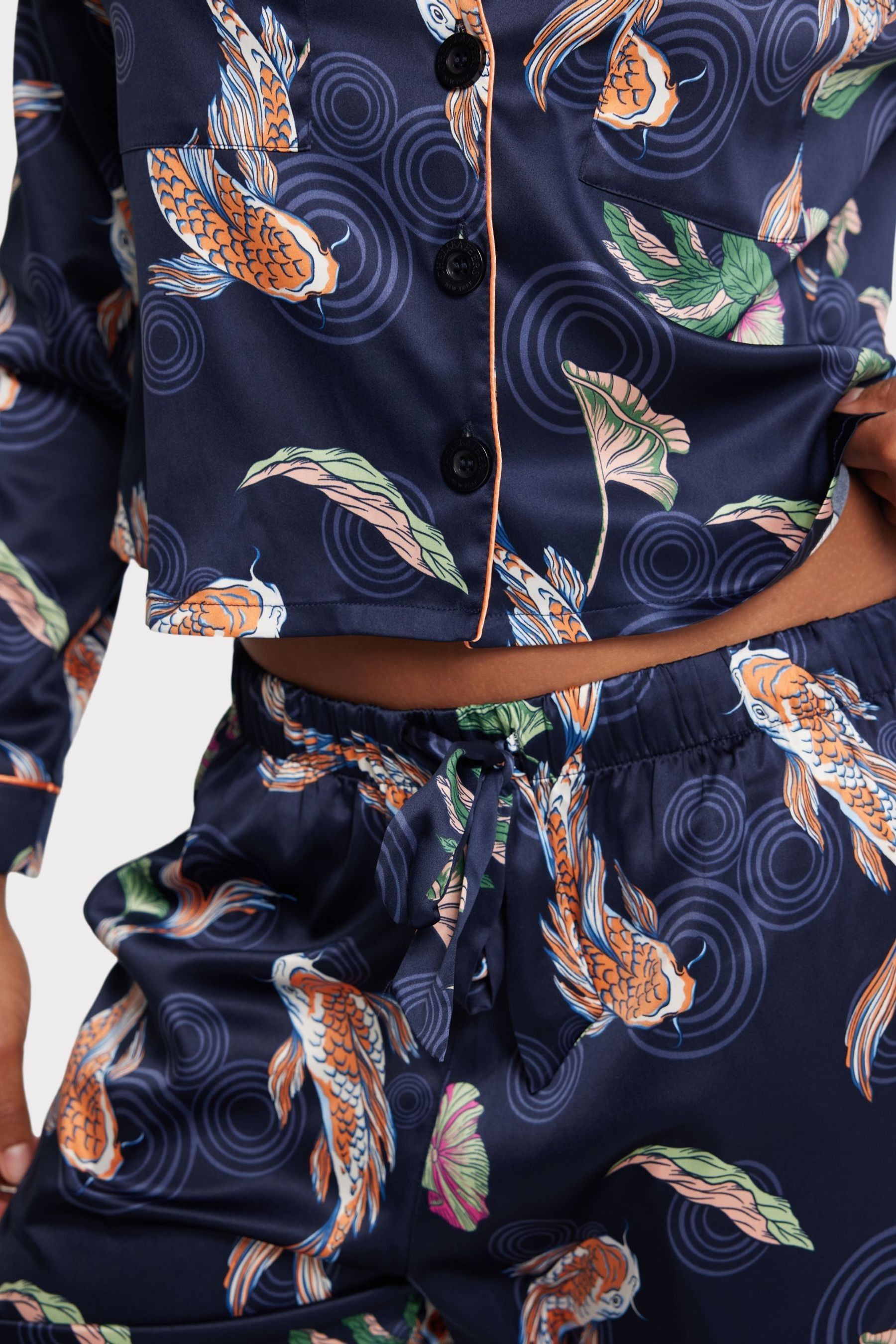 Buy Chelsea Peers Blue Curve Satin Koi Fish Print Long Pyjama Set from Next Luxembourg