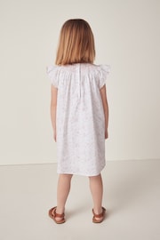 The White Company Celine Organic Cotton Hand Smocked Frill Sleeve White Dress - Image 2 of 12