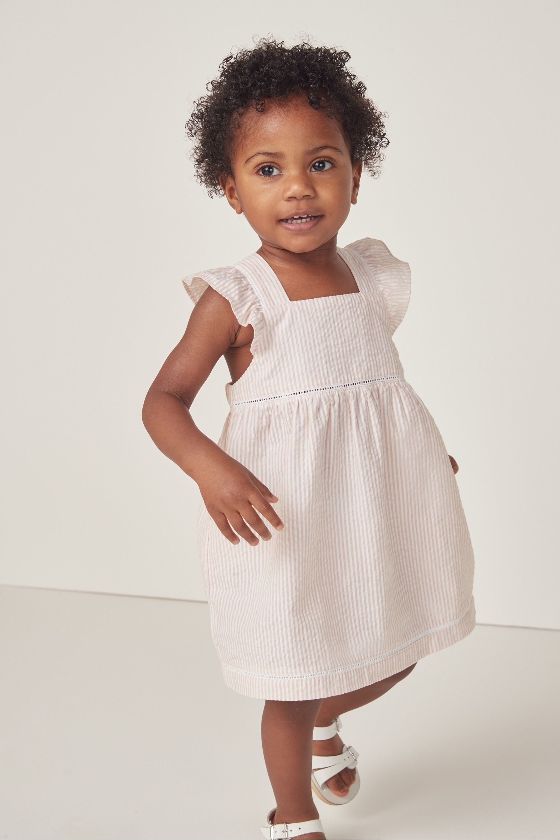 Buy The White Company Pink 100 Cotton Seersucker Stripe Ruffle Pinafore Dress from Next Luxembourg