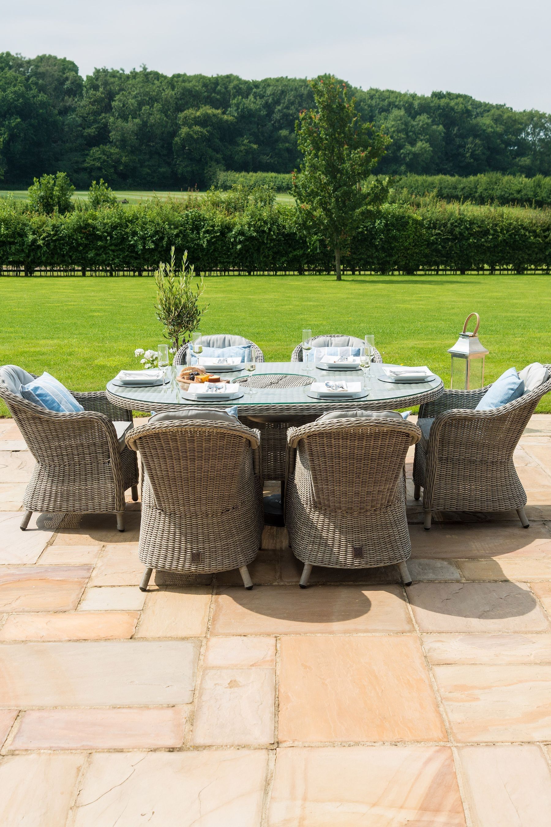 Buy Maze Light Grey Garden Rattan Oxford 6 Seat Oval Ice Bucket Dining Set from the Next UK online shop