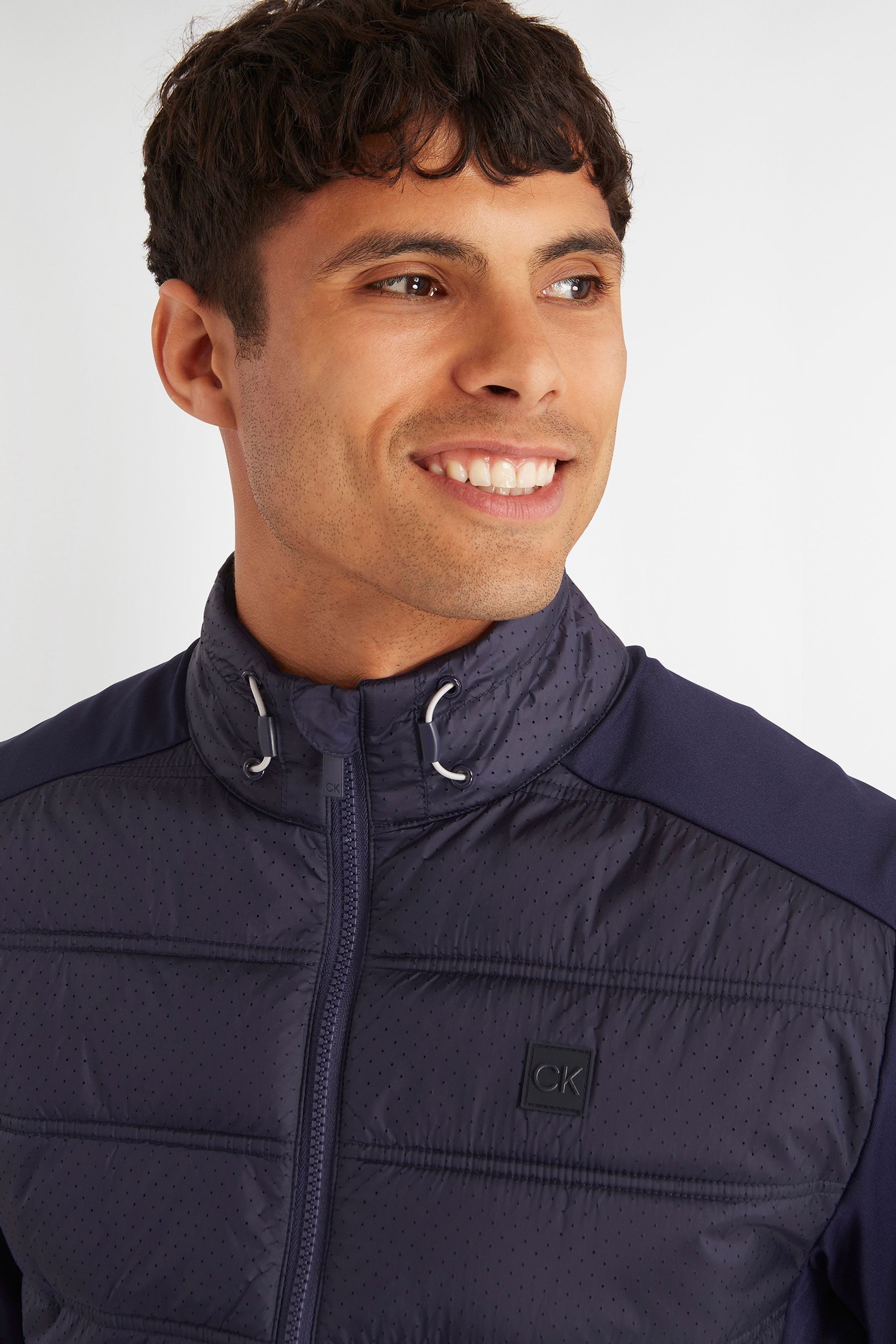 Buy Calvin Klein Golf Blue Rangewood Full Zip Hybrid Jacket from Next Ireland
