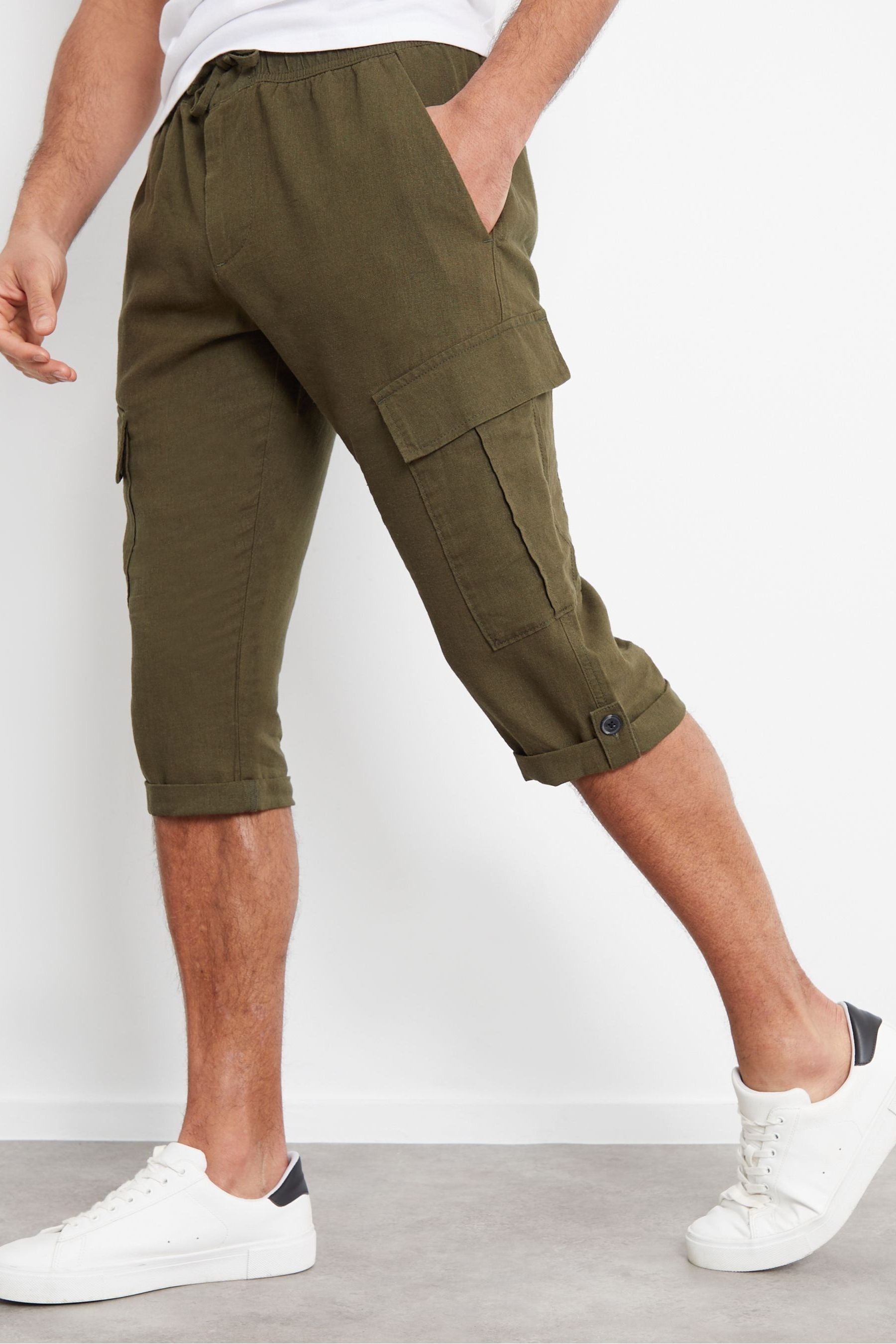 Quarter length trousers top