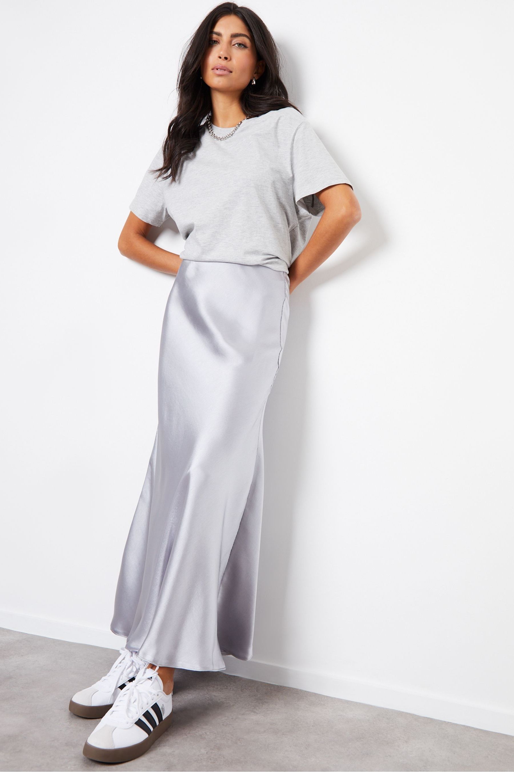 Satin skirt silver top