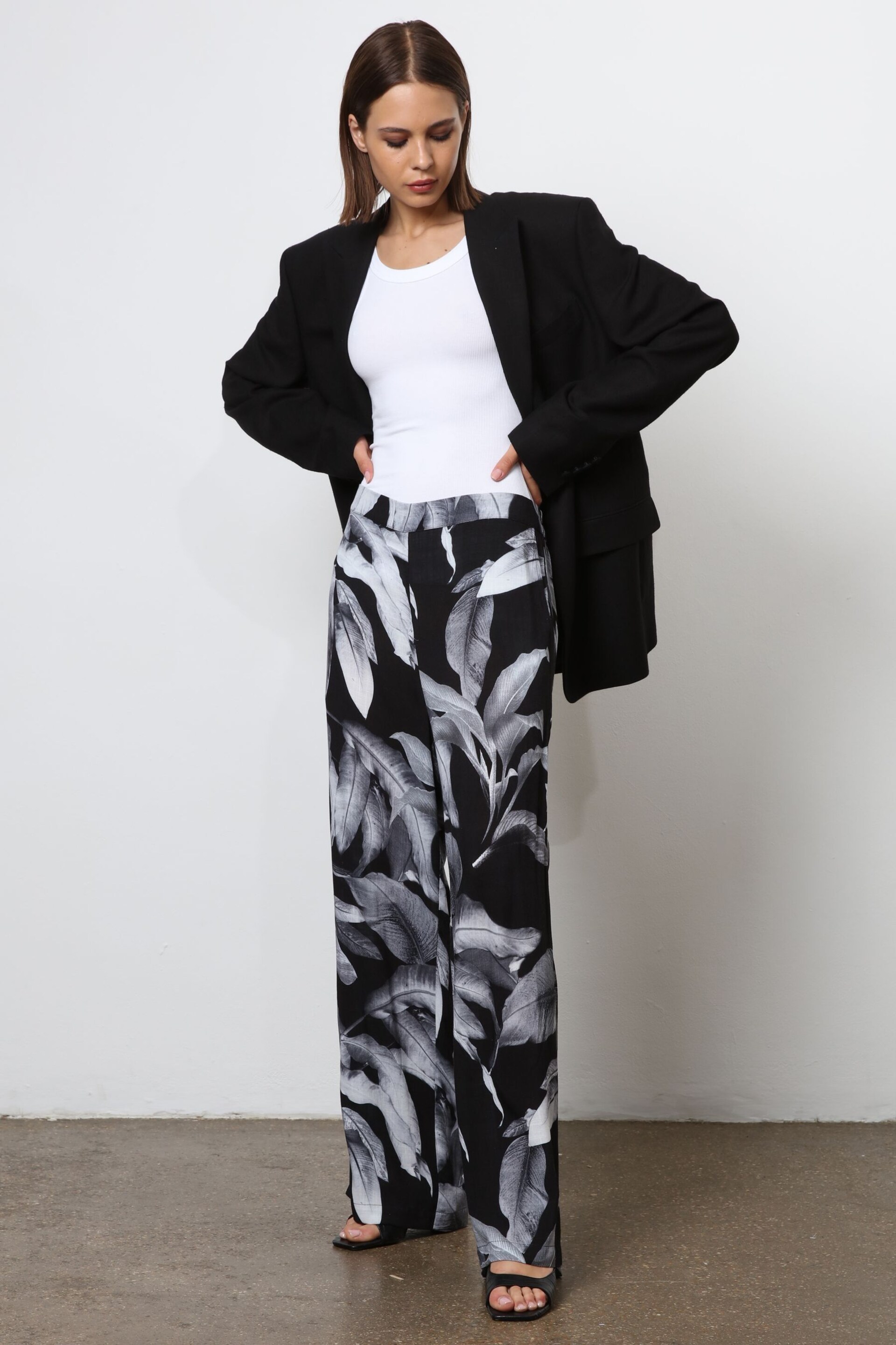 Religion Black Wide Leg Trousers in Botanic Print in Crepe - Image 1 of 7