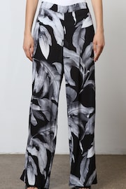 Religion Black Wide Leg Trousers in Botanic Print in Crepe - Image 2 of 7