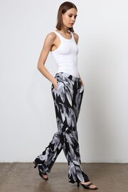 Religion Black Wide Leg Trousers in Botanic Print in Crepe - Image 5 of 7