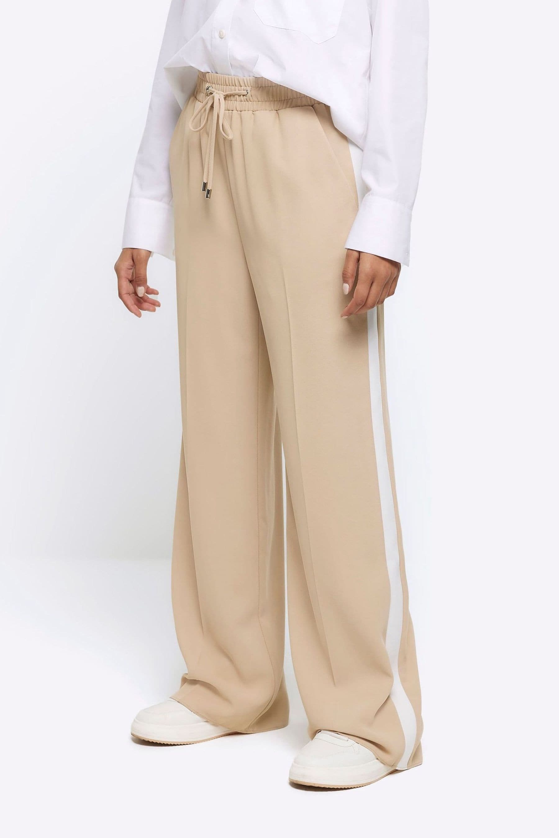 Buy River Island Beige Side Stripe Tailored Trousers from Next Poland