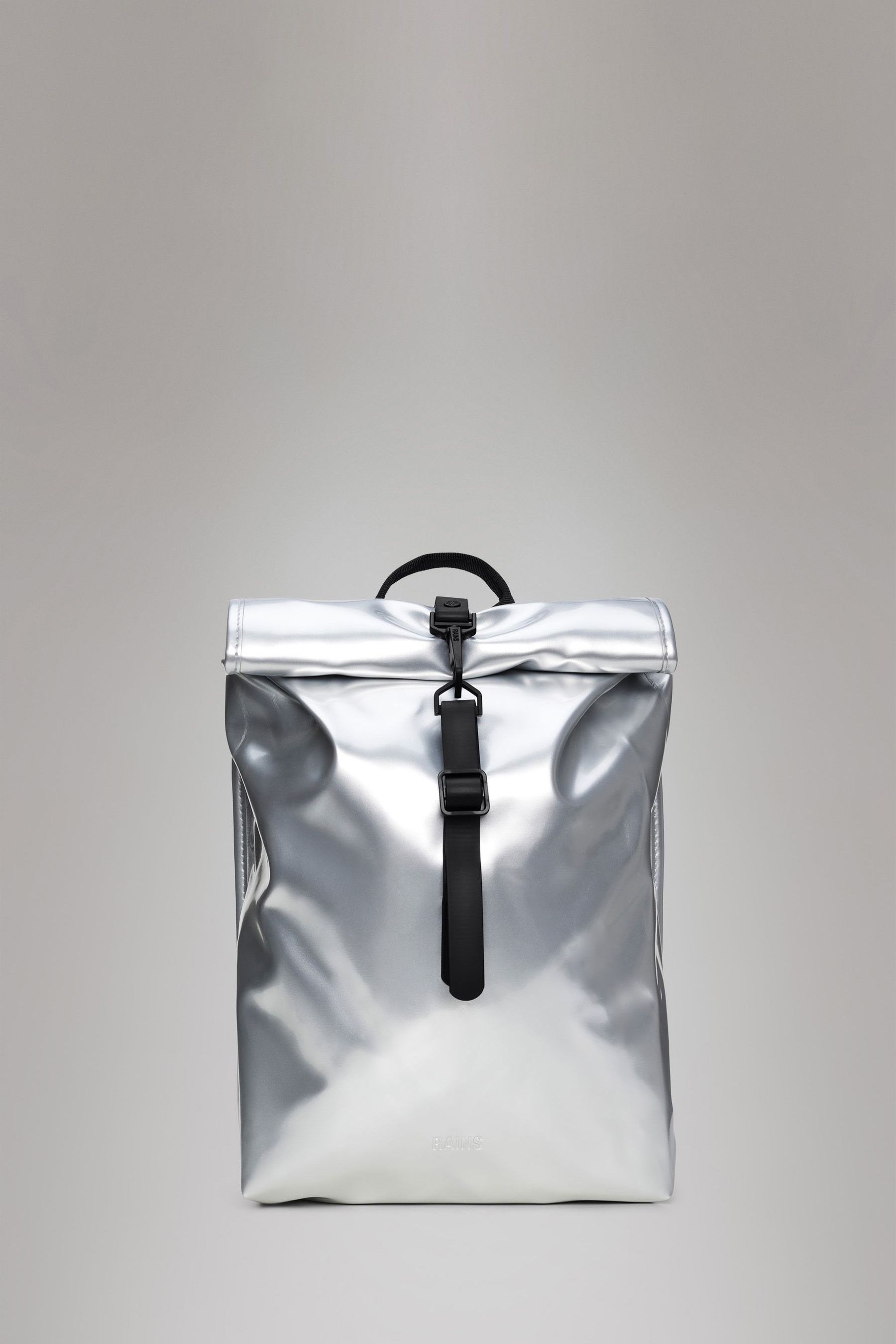 Buy Rains Silver Rolltop Rucksack Mini Bag from Next Ireland