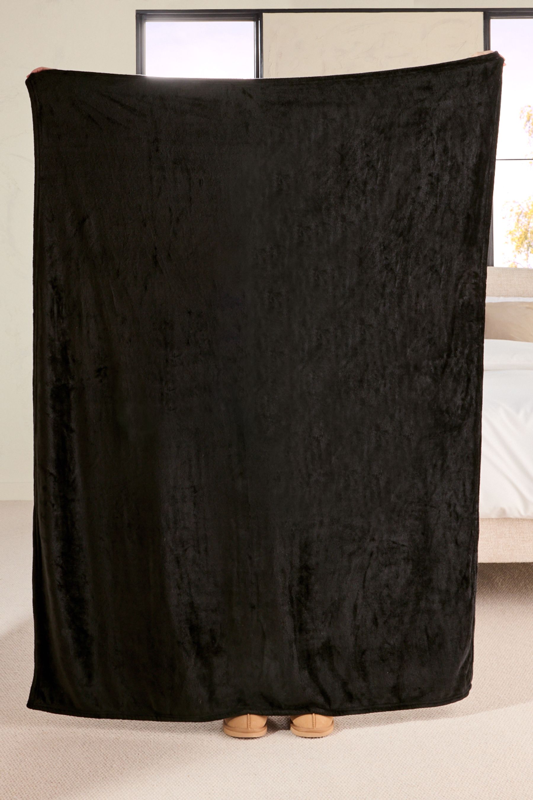 Buy Black Plush Fleece Throw from the Next UK online shop
