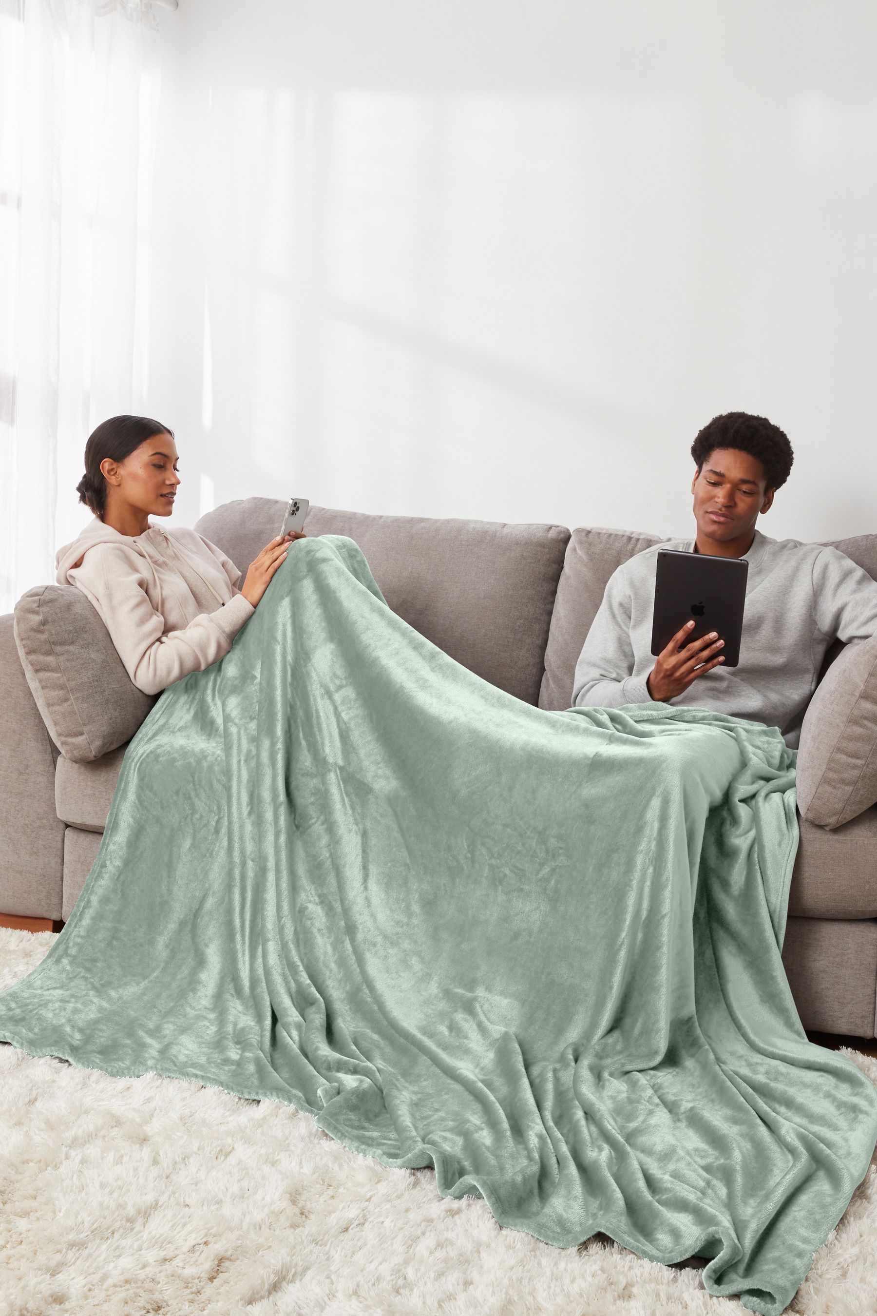 Buy Sage Green Plush Fleece Throw from Next Germany