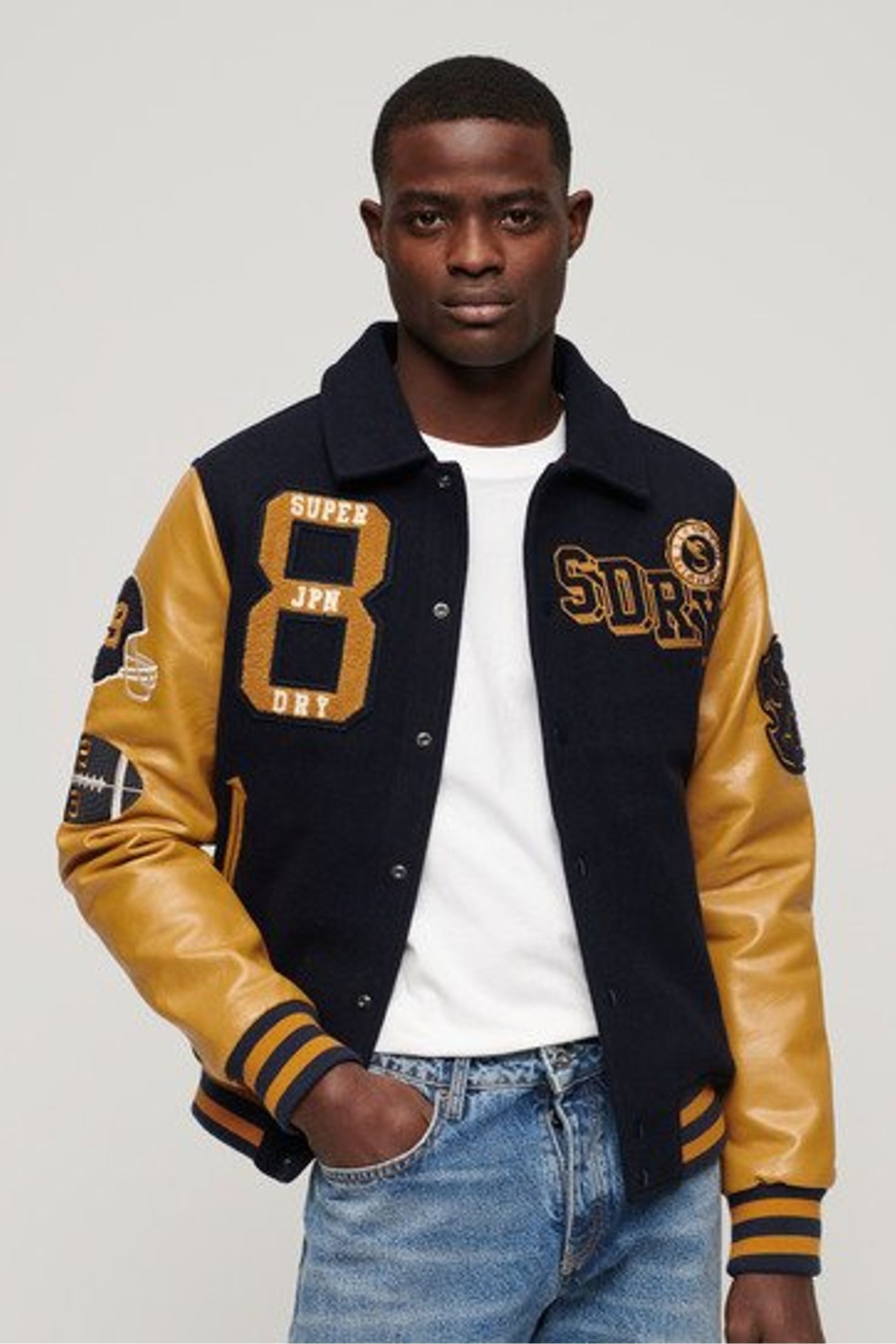 Patched bomber jacket online