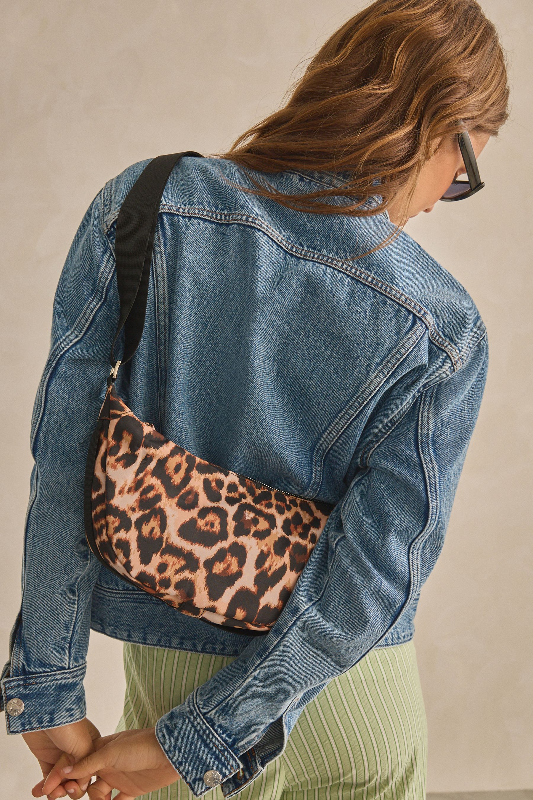 Buy Leopard Sling Cross Body Bag from the Next UK online shop