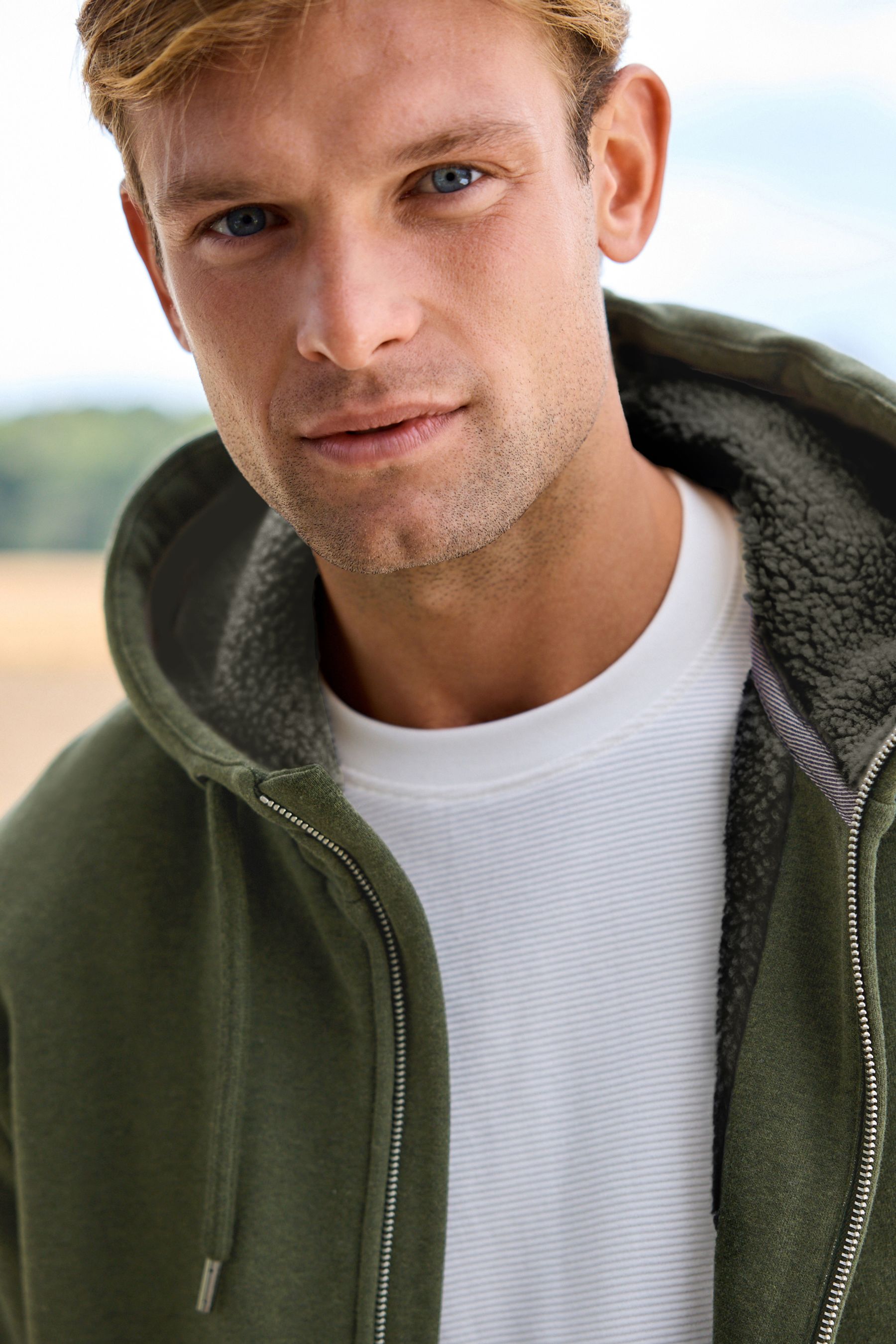 Buy Khaki Green Borg Fleece Lined Zip Through Hoodie from Next Ireland