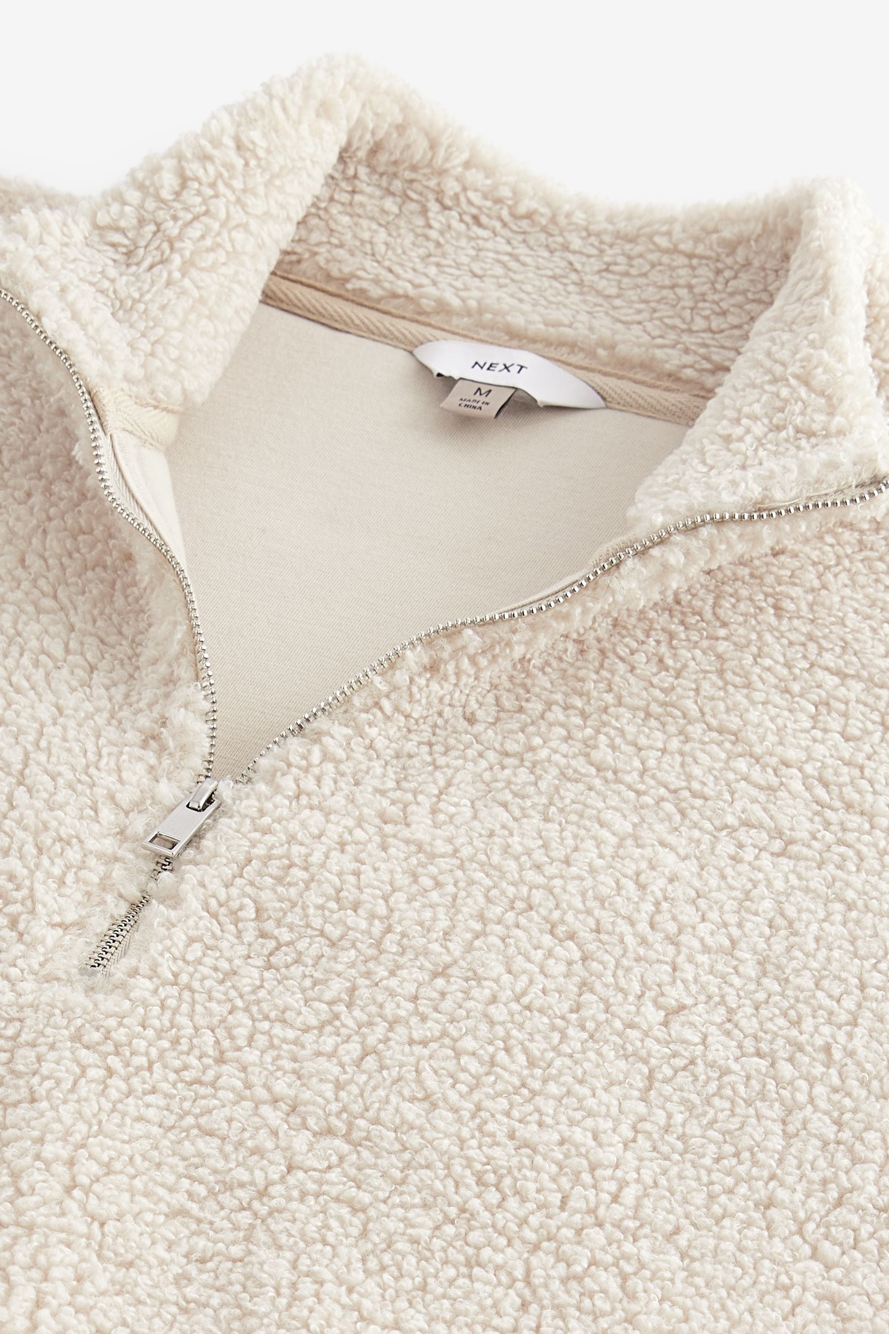 Fleece lined quarter zip top
