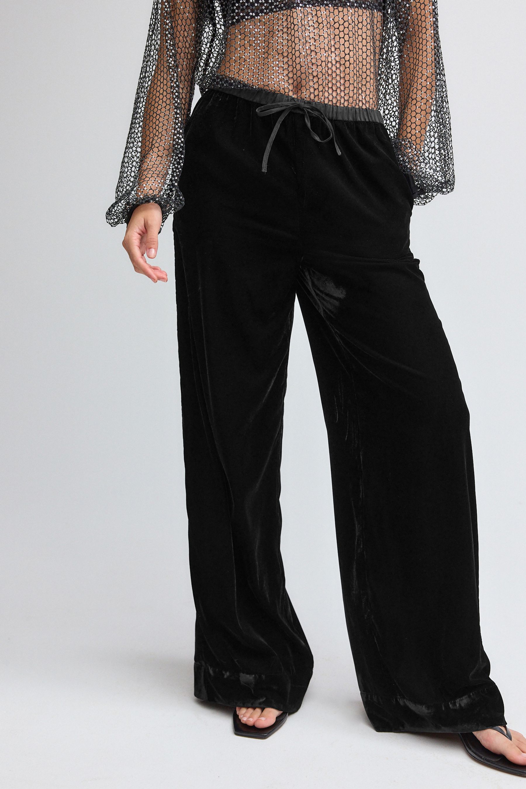 Next black velvet trousers shop