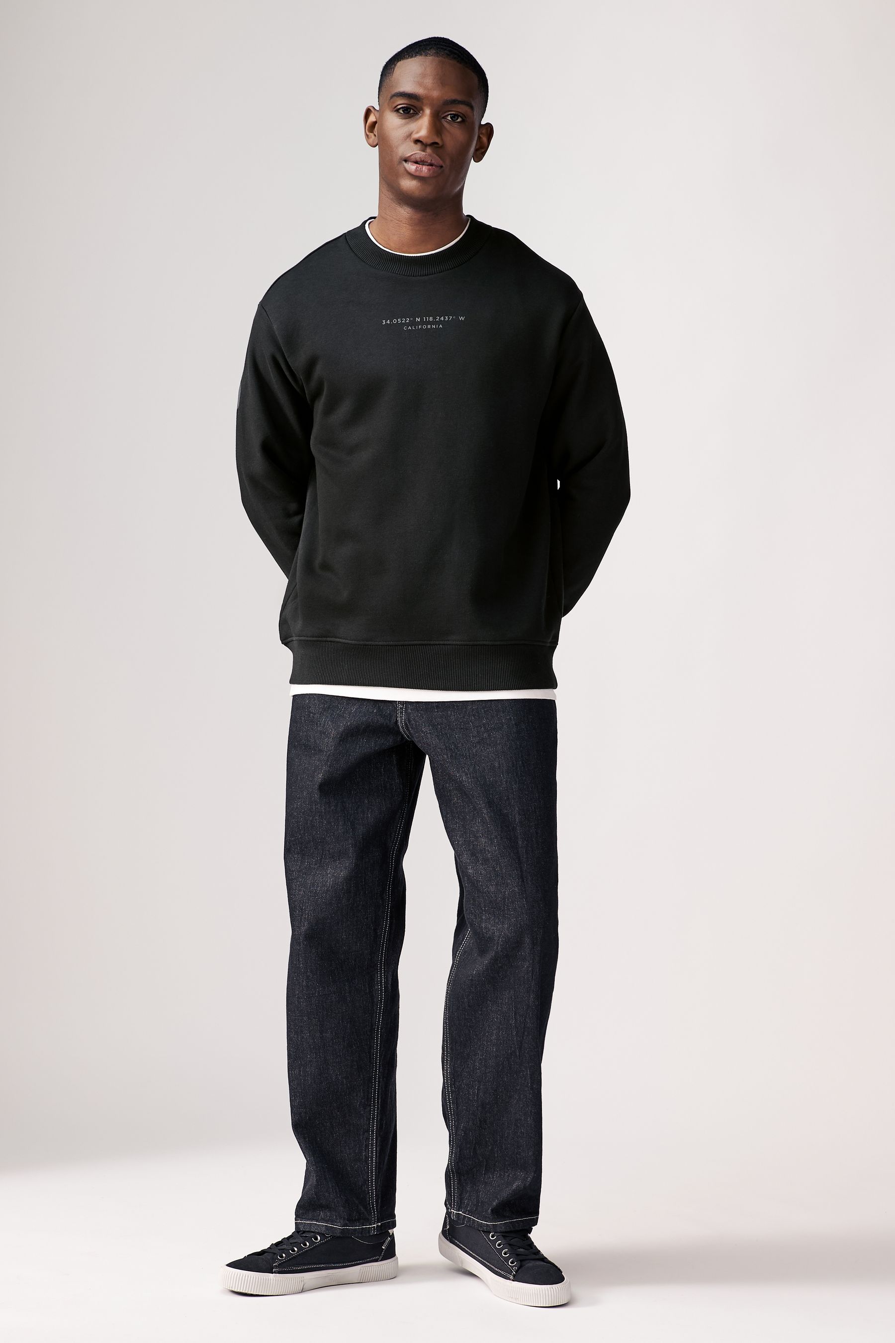 Black crew neck graphic sweatshirt on sale