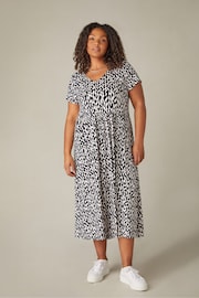 Live Unlimited Curve Mono Curl Print Jersey Short Sleeve Black Midi Dress - Image 1 of 6