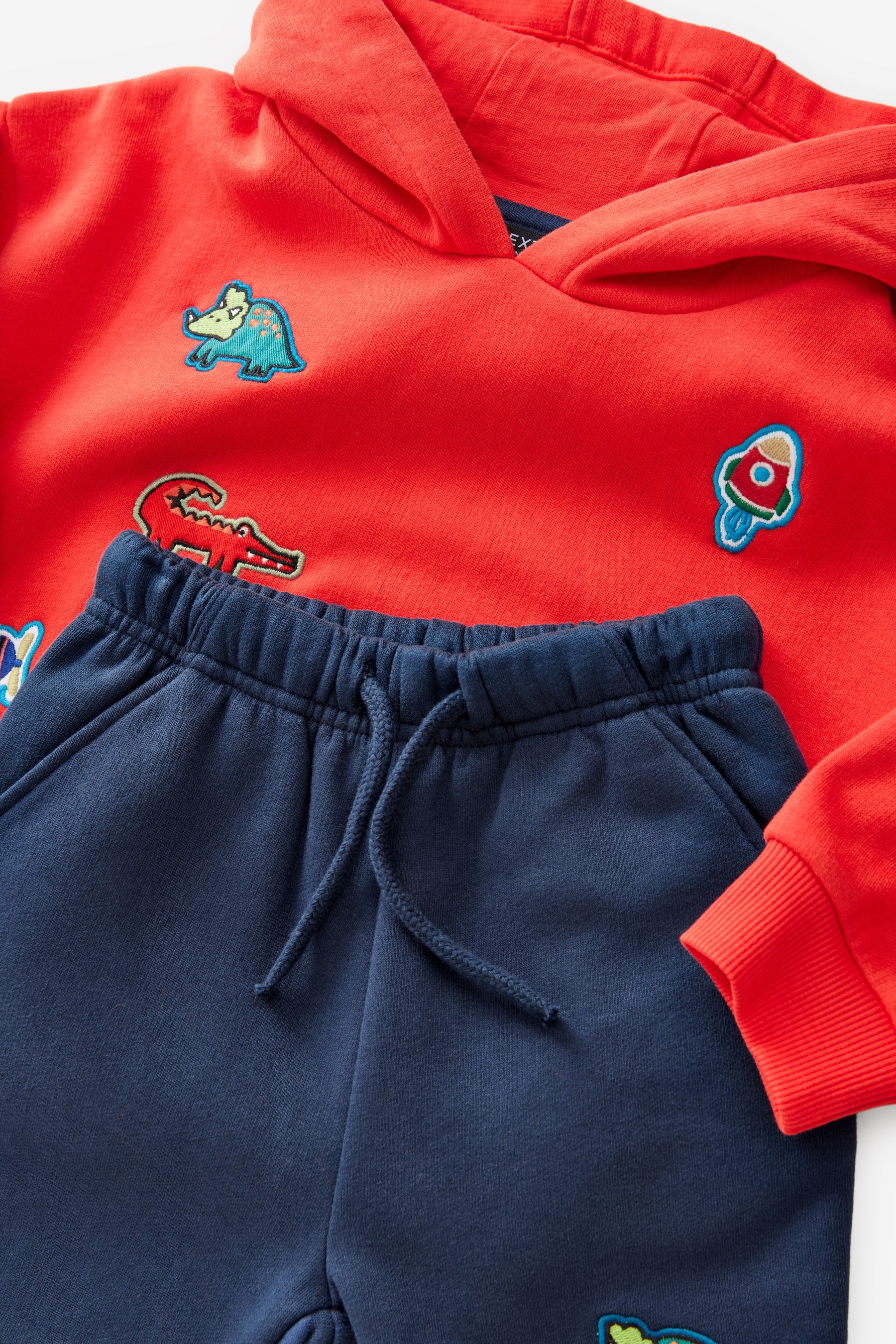 Blue and red joggers hotsell