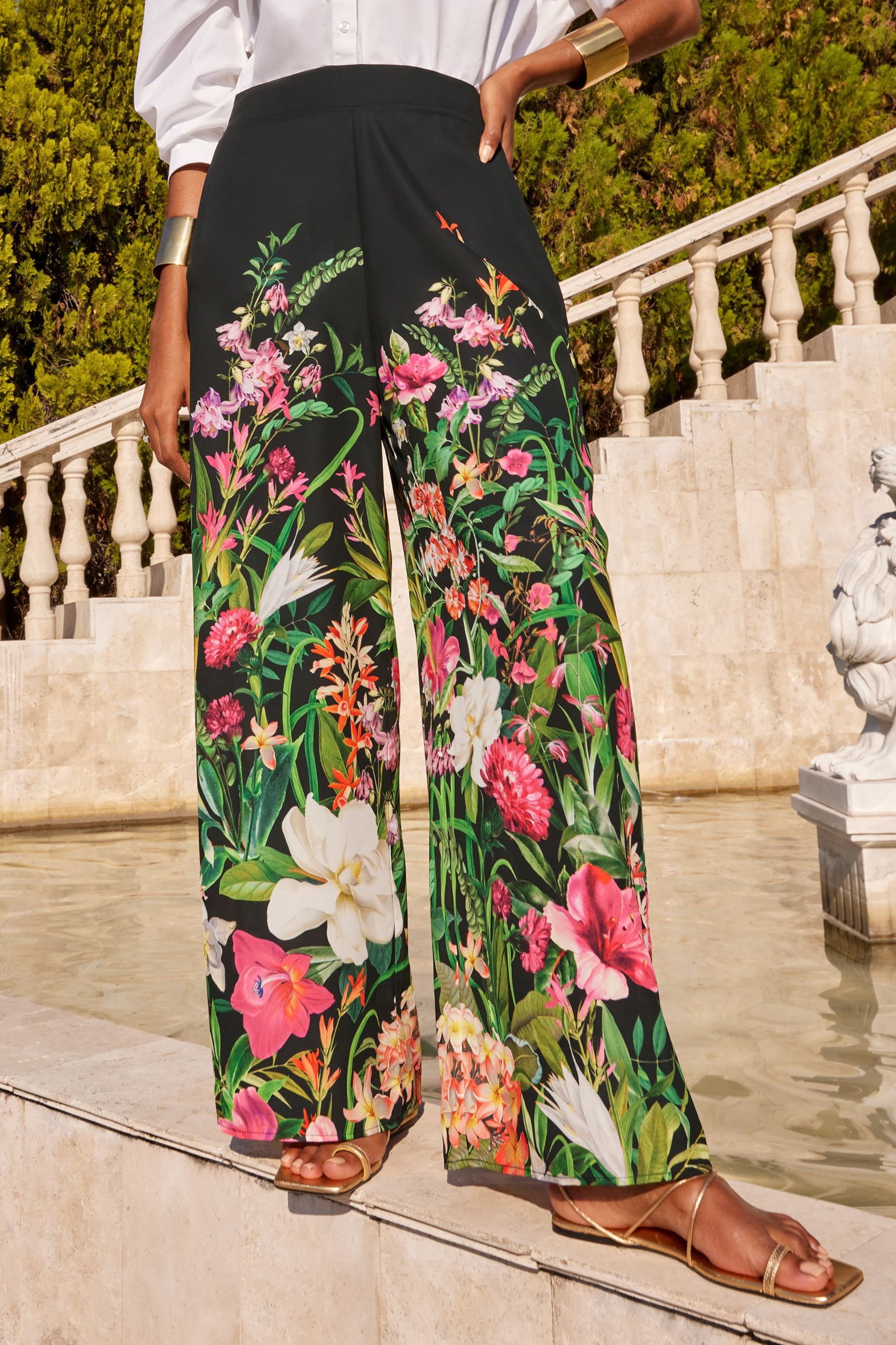 V&A | Love & Roses Black Floral Palazzo Wide Leg Trousers - Image 1 of 4