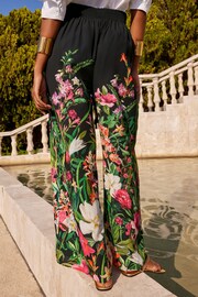 V&A | Love & Roses Black Floral Palazzo Wide Leg Trousers - Image 2 of 4